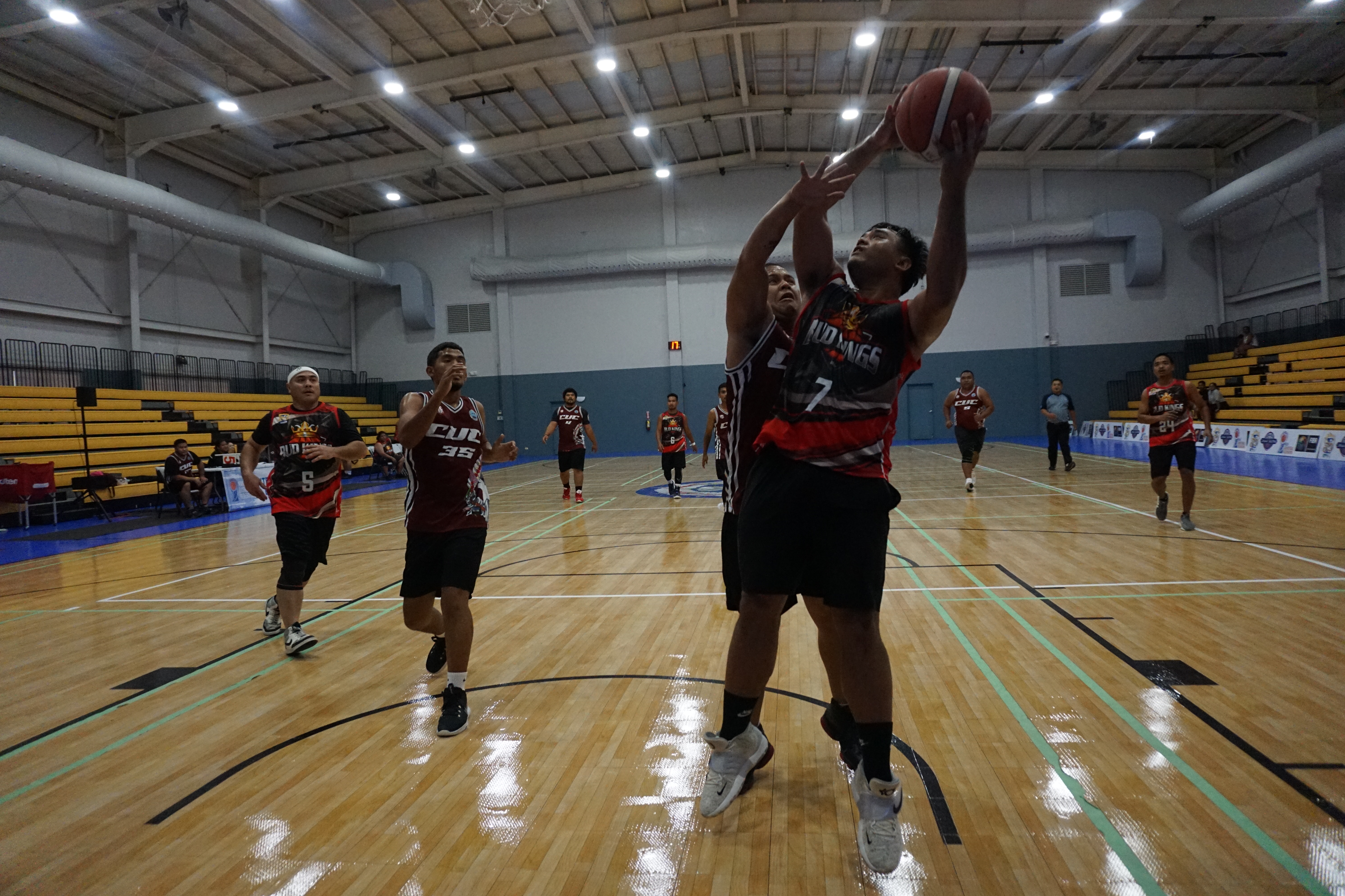 Marpac's Greg Sablan gets fouled as he goes up for the finish against CUC during a basketball game of the 2023 R&J Wine and Liquor Inter-Government/Business League Tuesday at the Ada gym.