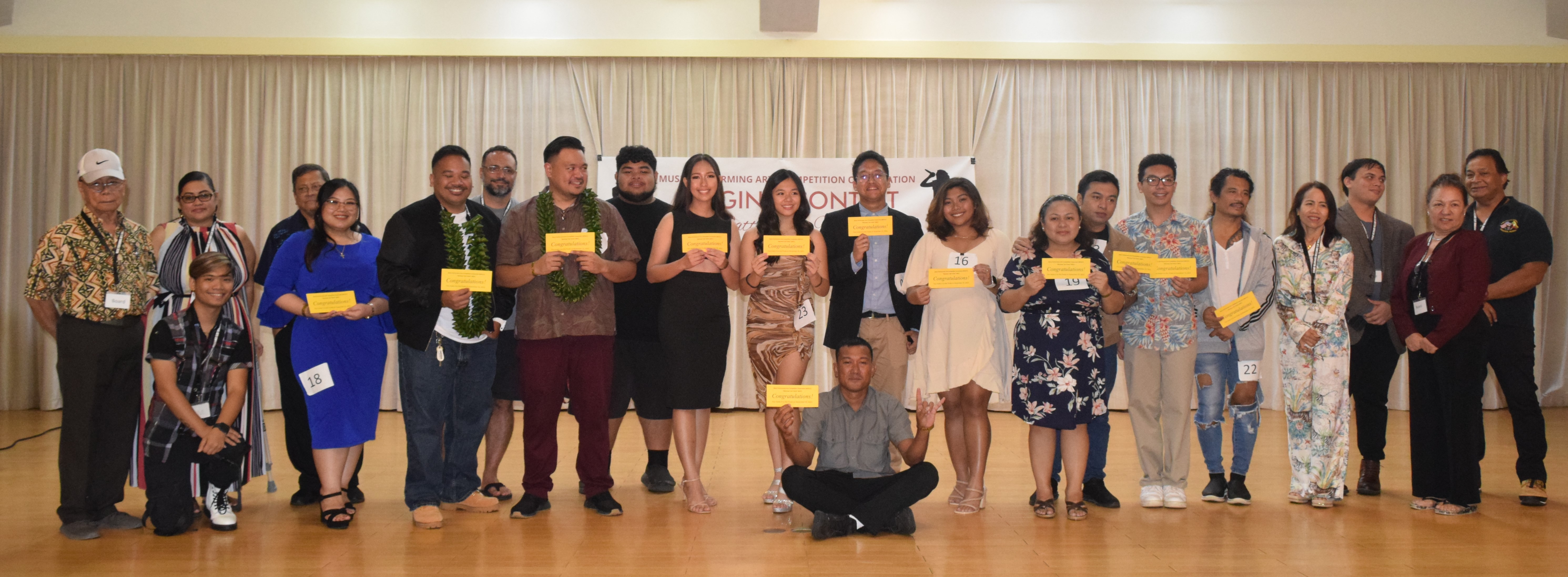 The finalists of Marianas Got Talent pose for a photo with the competition judges and Music Performing Arts Competition Corp. officers at the multi-purpose center on Saturday. 