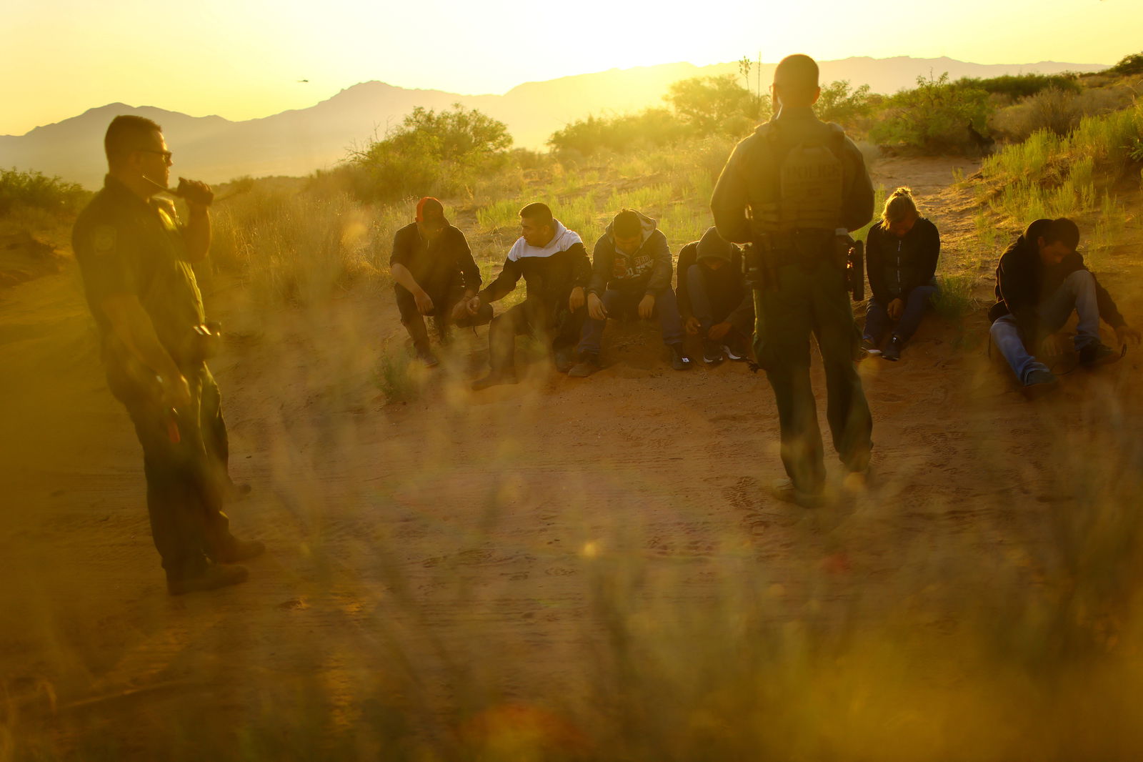 U.S. Border Patrol agents detain migrants who attempted to cross the U.S.-Mexico border undetected, in a desert area outside Sunland Park, New Mexico, U.S., June 23 2023. REUTERS/Jose Luis Gonzalez