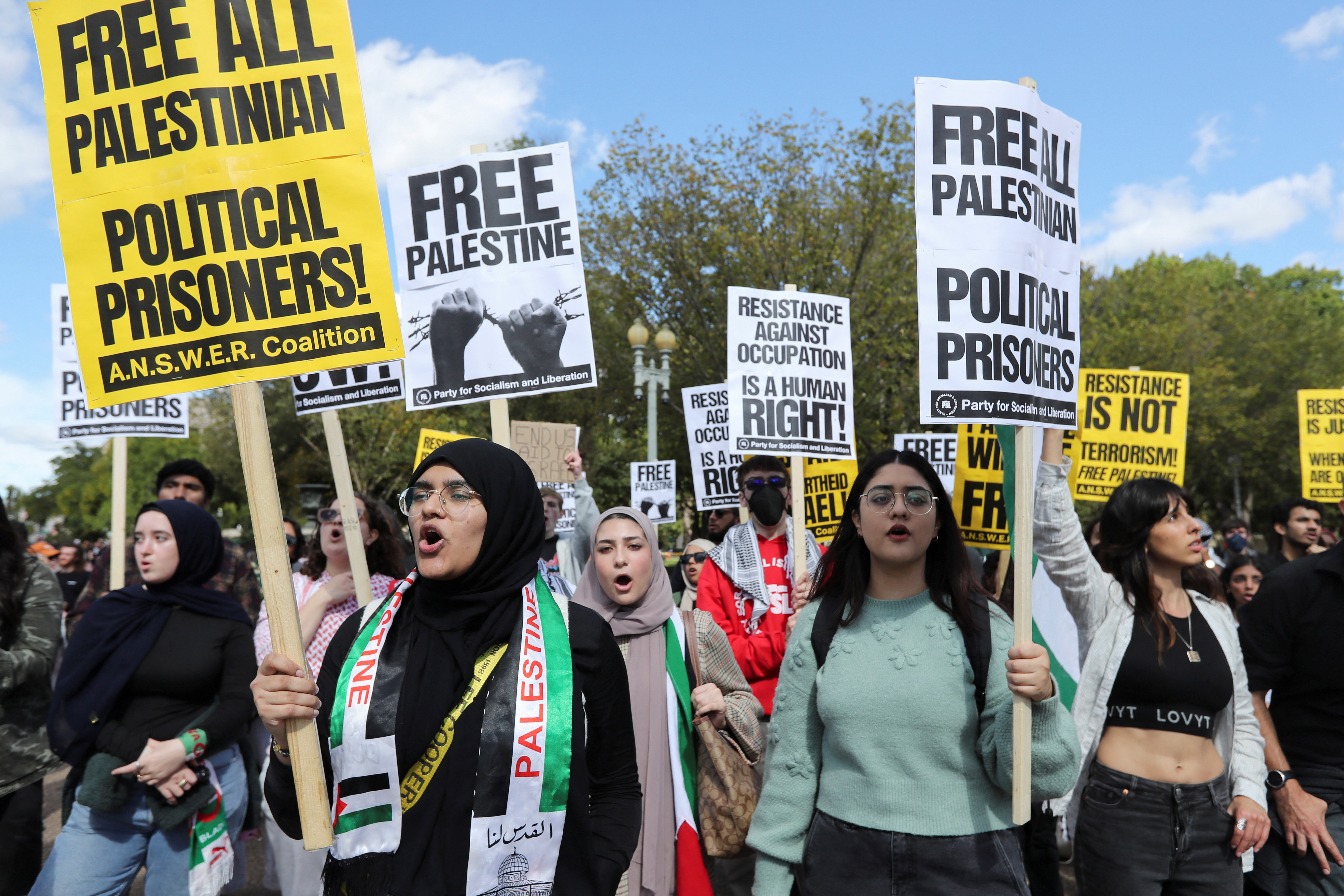 Supporters of the Palestinian people from the Palestinian Youth Movement and other groups demonstrate outside the White House about the conflict between Israel and Hamas, during a protest in Washington, U.S., October 8, 2023.