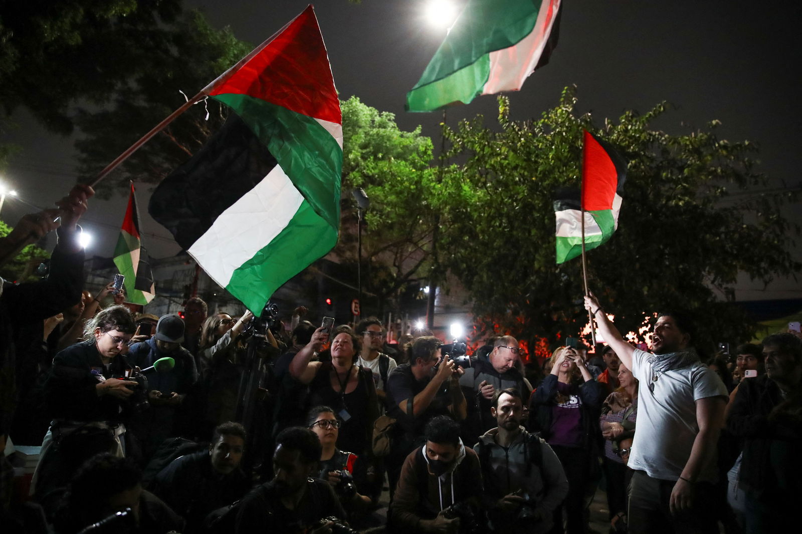 People wave Palestinian flags during a pro-Palestinian demonstration, in Sao Paulo, Brazil, October 10, 2023. 