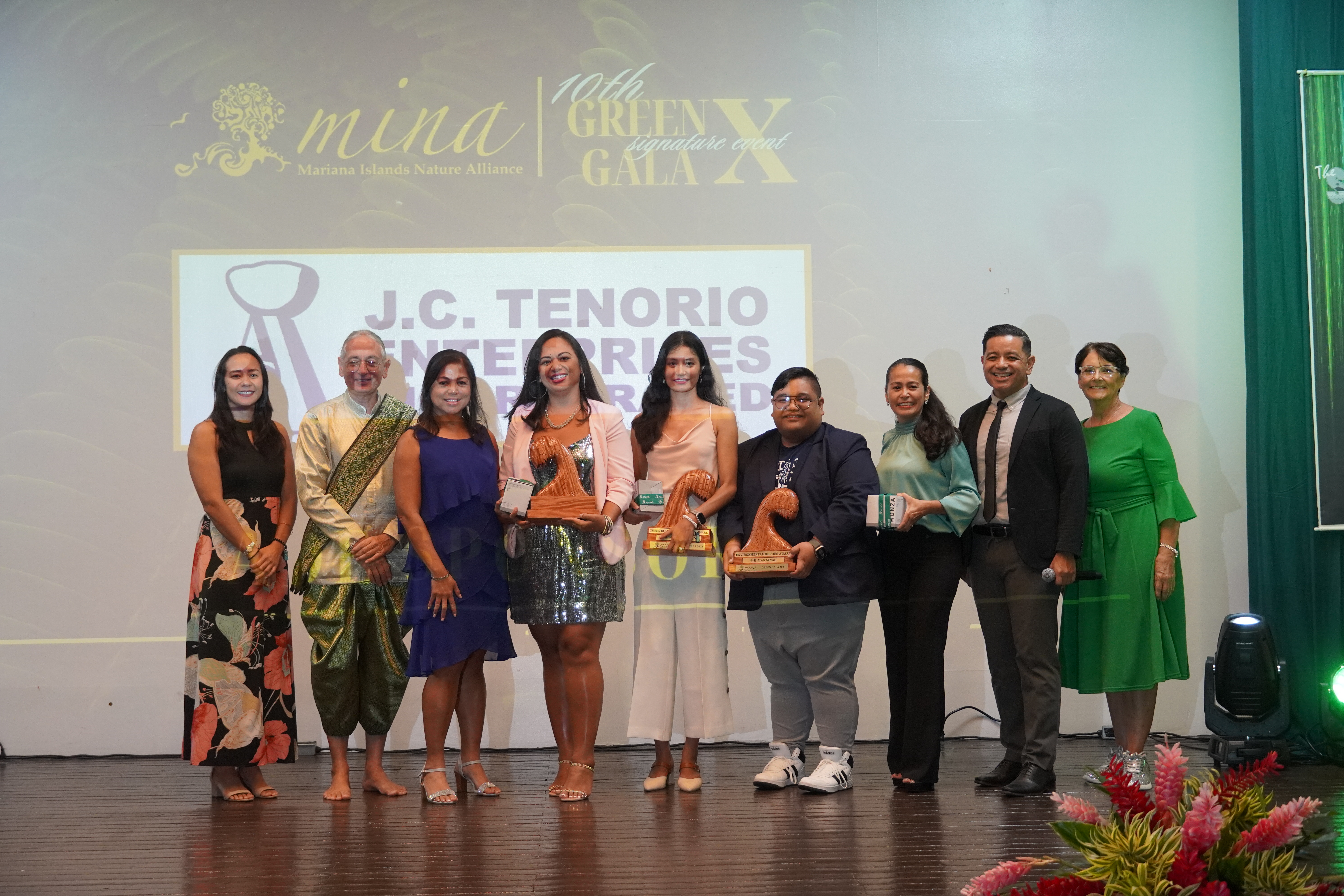 Environmental stewards who were honored by MINA pose for a photo with their awards: former Rep. Sheila Babauta, Elina Chhetri, owner of Marianas Creations, and Robbie Suzuki, NMC-CREES extension agent, representing NMC’s 4-H Club.