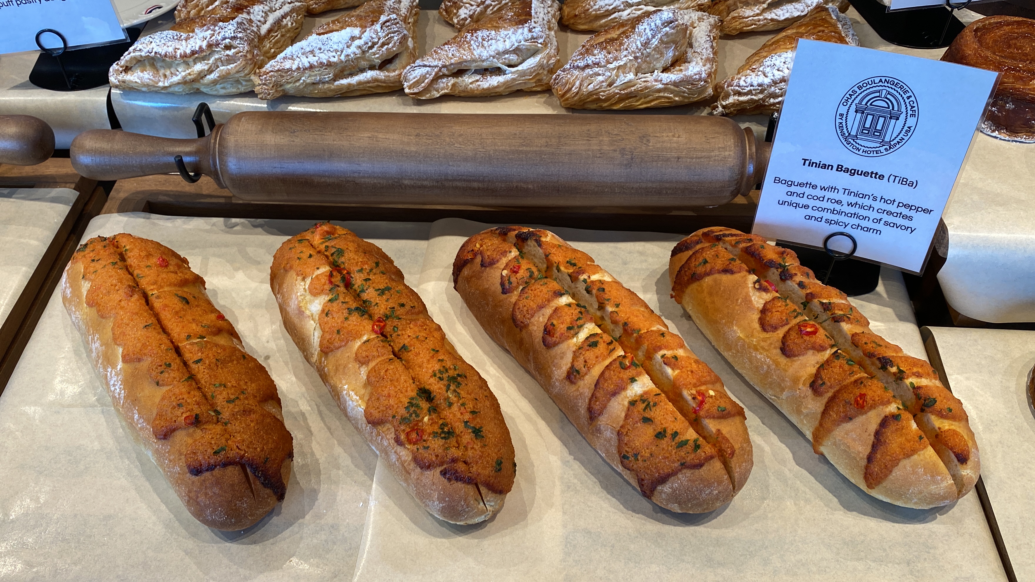 The Tinian Baguette, a French baguette with Tinian hot peppers and cod roe.