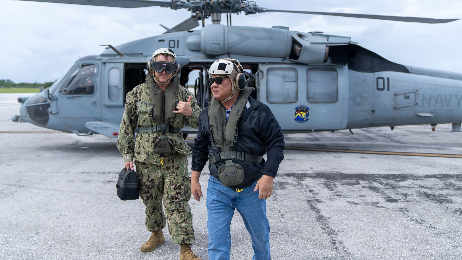 Gov. Arnold I. Palacios, right, with U.S. Navy Capt. Harry Elliott IV after landing on Rota Wednesday. The governor, along with Elliot, CNMI Homeland Security and Emergency Management Special Assistant Franklin Babauta, Federal Emergency Management Agency Region 9 team lead Teresa Serata, and Rota Mayor Aubry Hocog conducted an initial aerial assessments of Rota prior to their ground visit.