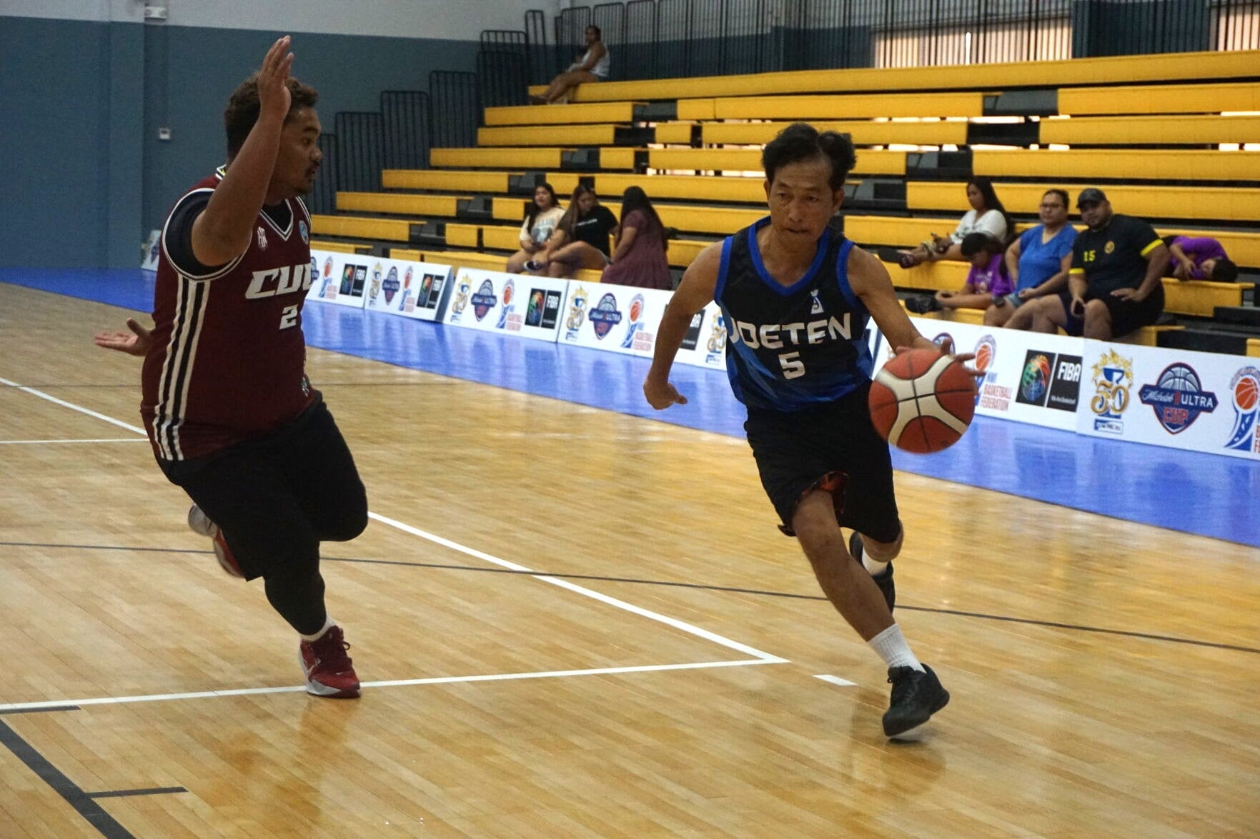 Joeten's Ferdinand Tobias attempts to drive past a defender during a basketball game of the 2023 R&J Wine and Liquor Inter-Government/Business League  at the Ada gym.