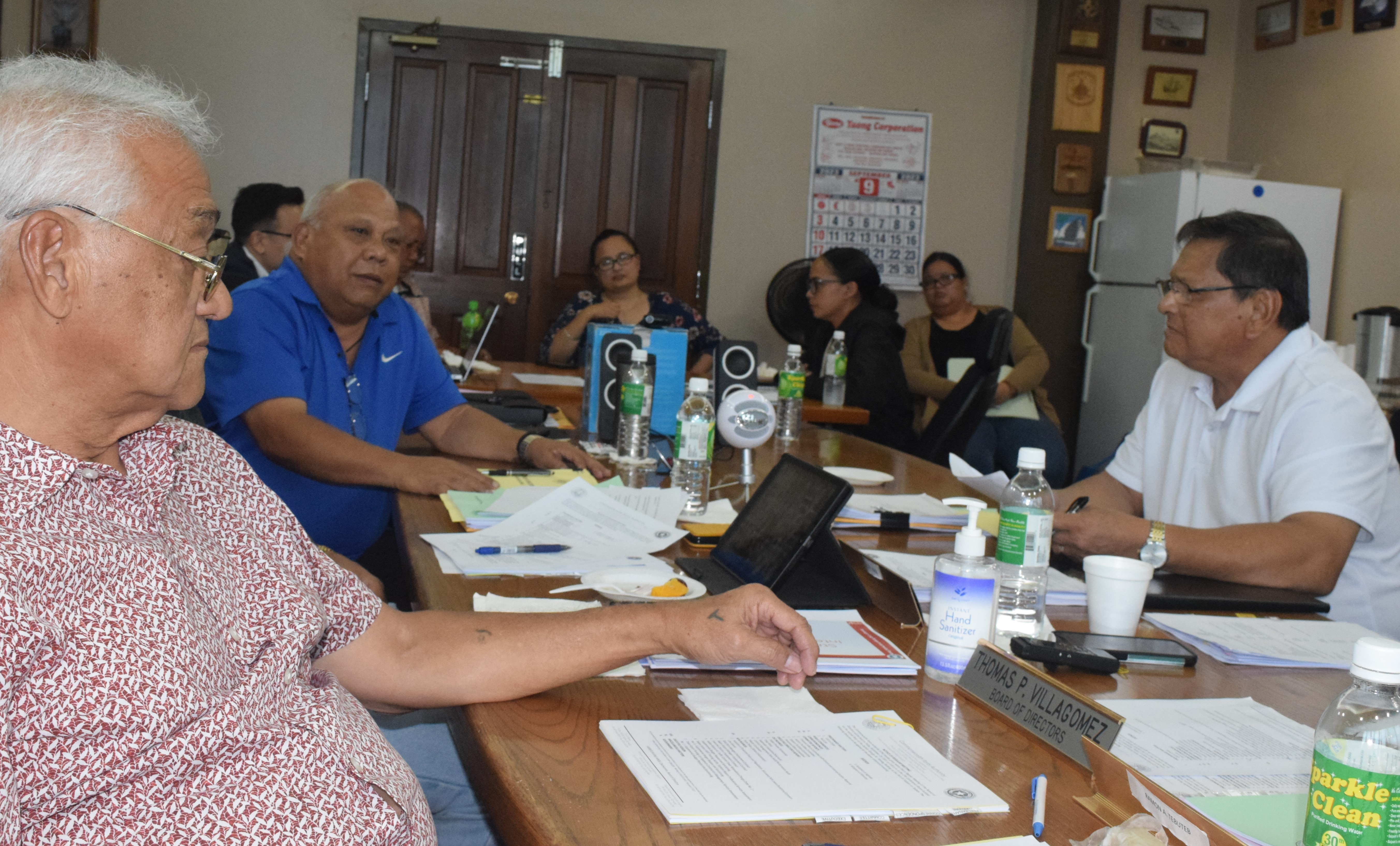 Commonwealth Ports Authority board member Antonio B. Cabrera speaks as fellow board members Joseph Diaz, right, and Thomas "Kiyu" Villagomez, left, listen during a meeting in the Port of Saipan conference room.