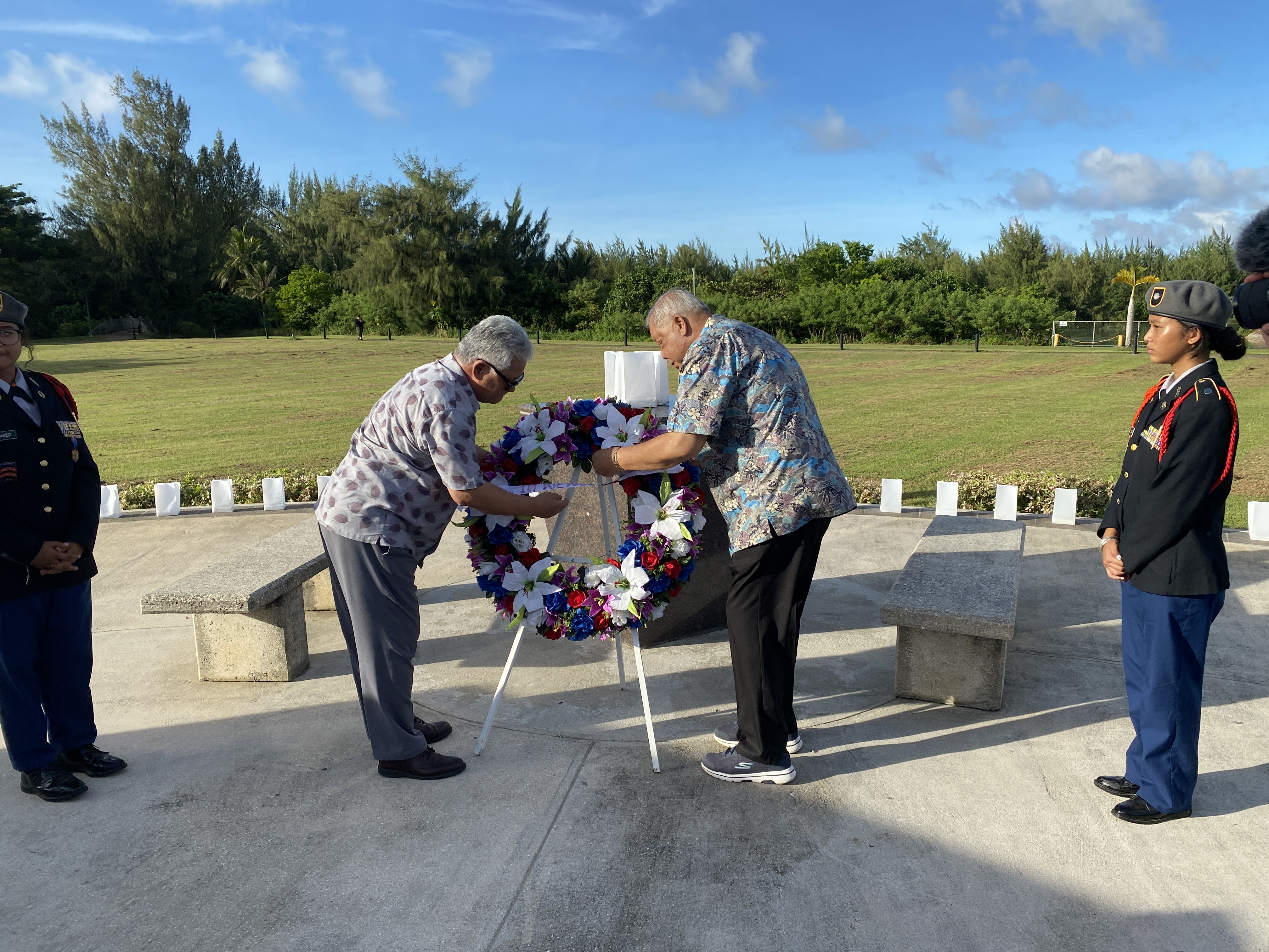 Gov. Arnold I. Palacios and Lt. Gov. David M. Apatang lay a wreath during a memorial service for the Chamorro and Carolinian war casualties of World War II.