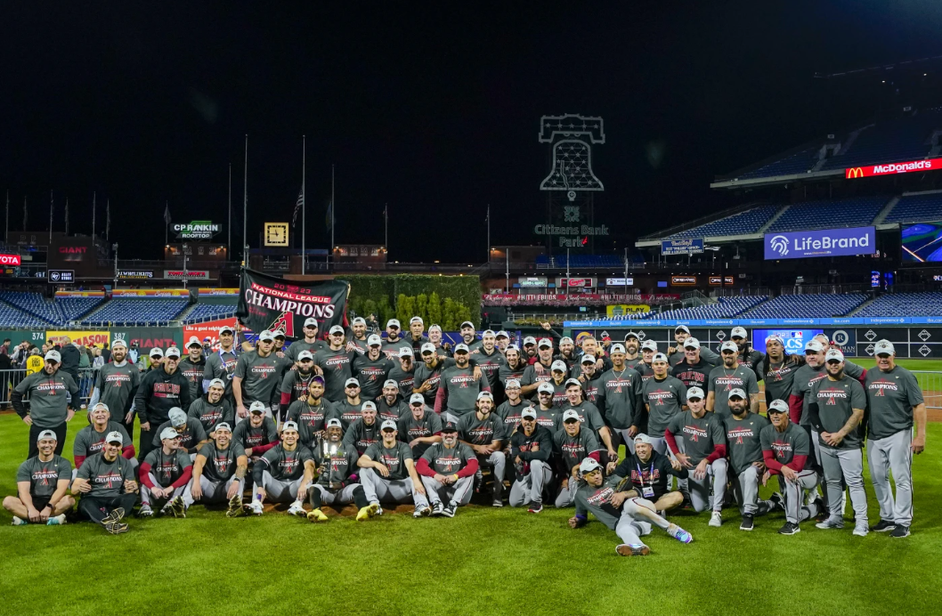 The Arizona Diamondbacks pose for a photo after beating the Philadelphia Phillies in Game 7 of the NL Championship Series in Philadelphia Tuesday, Oct. 23, 2023.