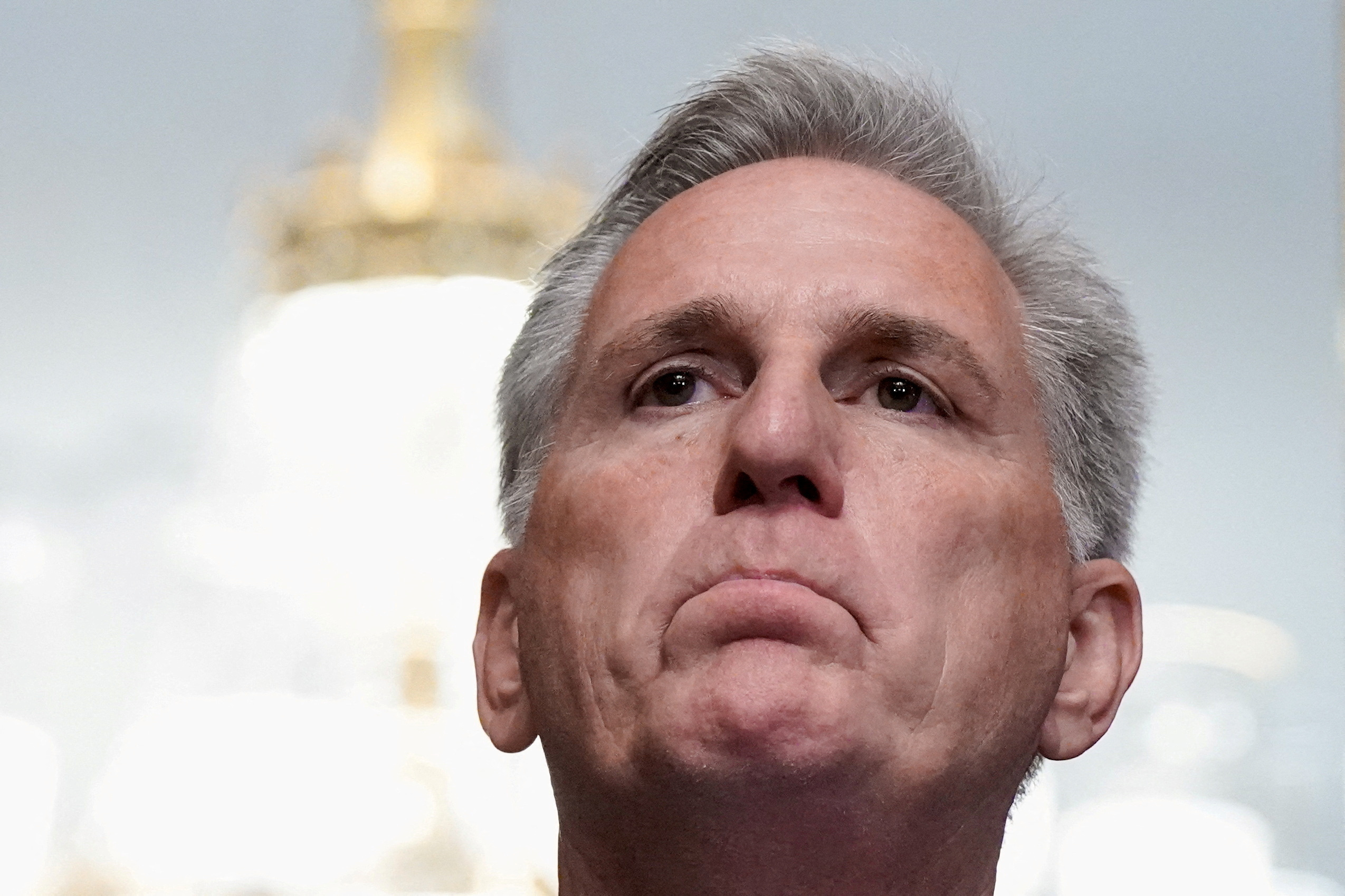 U.S. House Speaker Kevin McCarthy (R-CA) listens to a question as he talks to reporters in the U.S. Capitol after the House of Representatives passed a stopgap government funding bill to avert an immediate government shutdown, on Capitol Hill in Washington, U.S. September 30, 2023.
