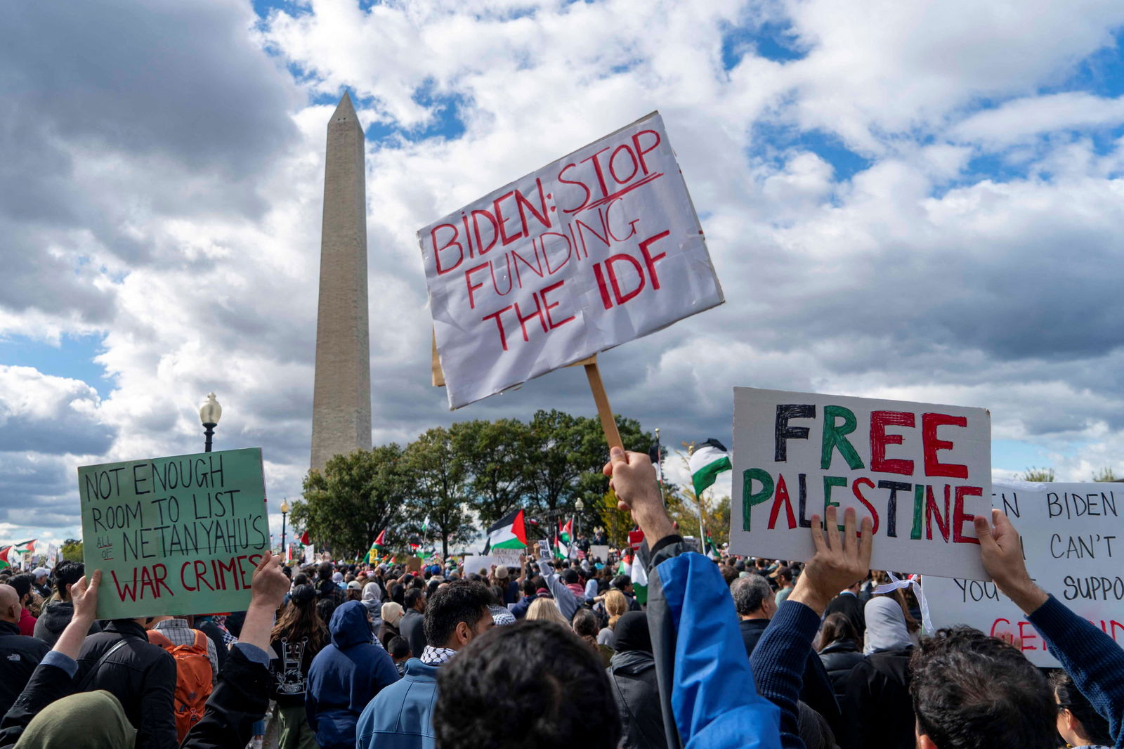 People gather for a rally held by American Muslims for Palestine calling for a cease fire in Gaza at the Washington Monument in Washington, U.S., October 21, 2023. 