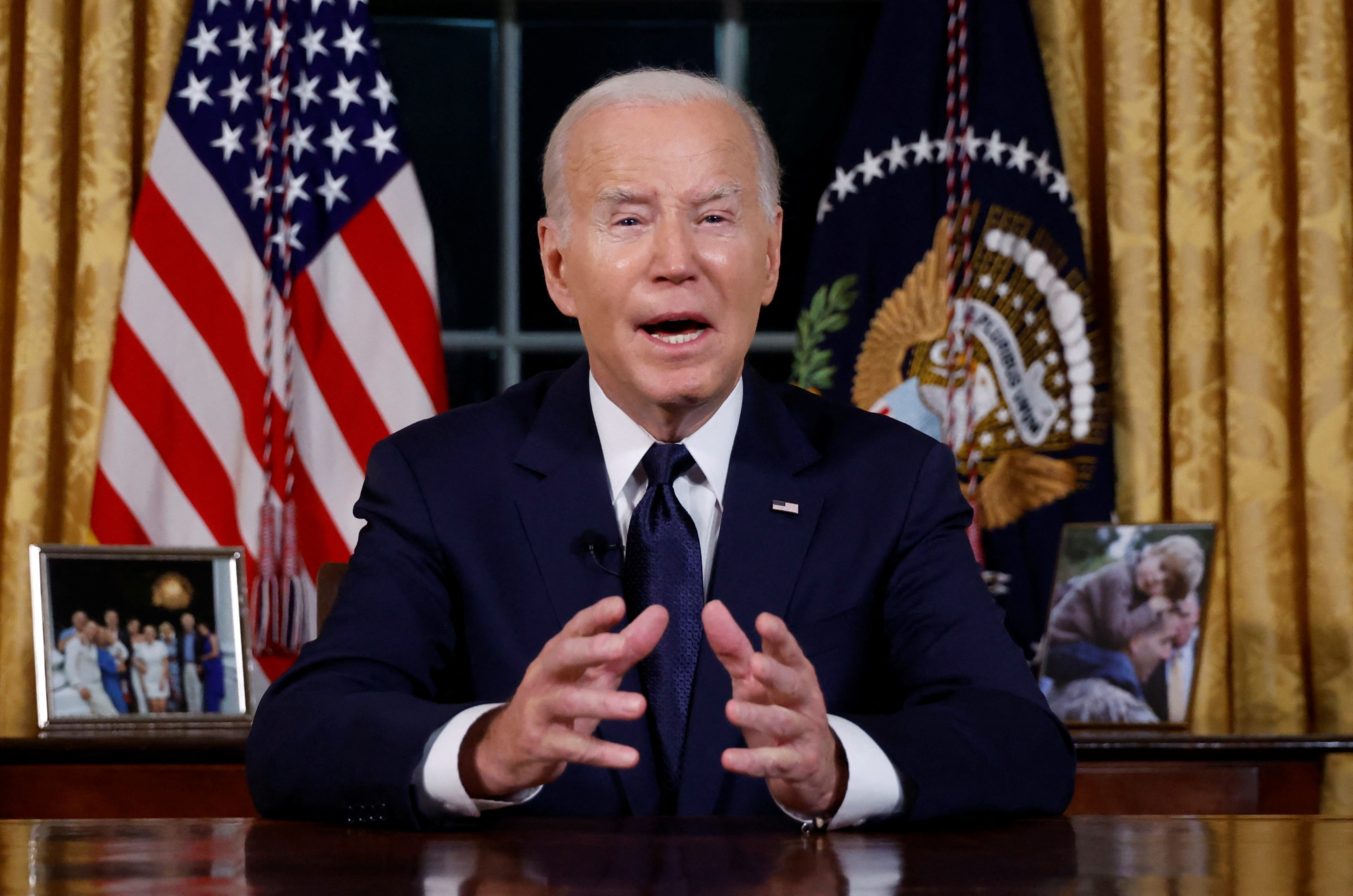 U.S. President Joe Biden delivers a prime-time address to the nation about his approaches to the conflict between Israel and Hamas, humanitarian assistance in Gaza and continued support for Ukraine in their war with Russia, from the Oval Office of the White House in Washington, U.S. October 19, 2023. 