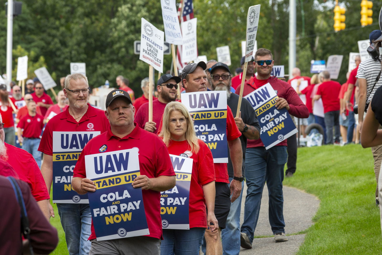 Members of the United Auto Workers hold a picket at Stellantis headquarters during their strike against Detroit's Big Three automakers, on Sept. 20, 2023, in Auburn Hills, Michigan. (Jim West/Zuma Press/TNS)