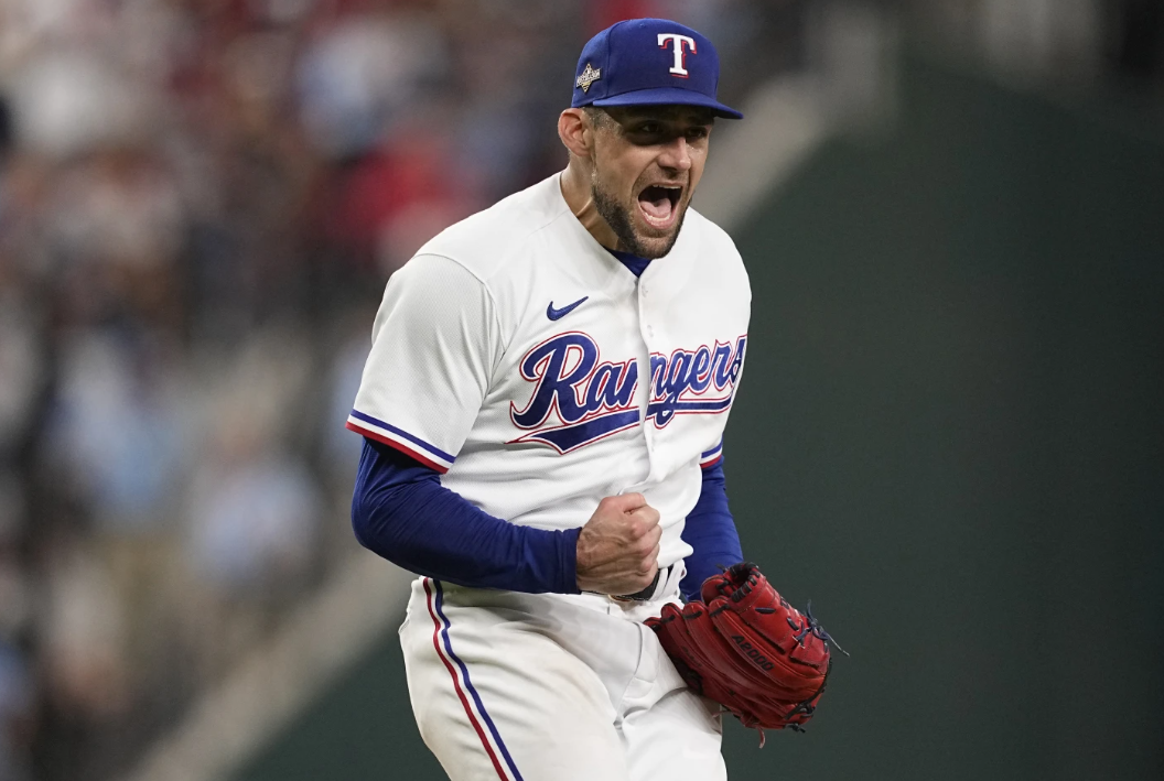 Texas Rangers starting pitcher Nathan Eovaldi celebrates after striking out Baltimore Orioles’ Jordan Westburg in the seventh inning of Game 3 of a baseball AL Division Series on Tuesday, Oct. 10, 2023, in Arlington, Texas.