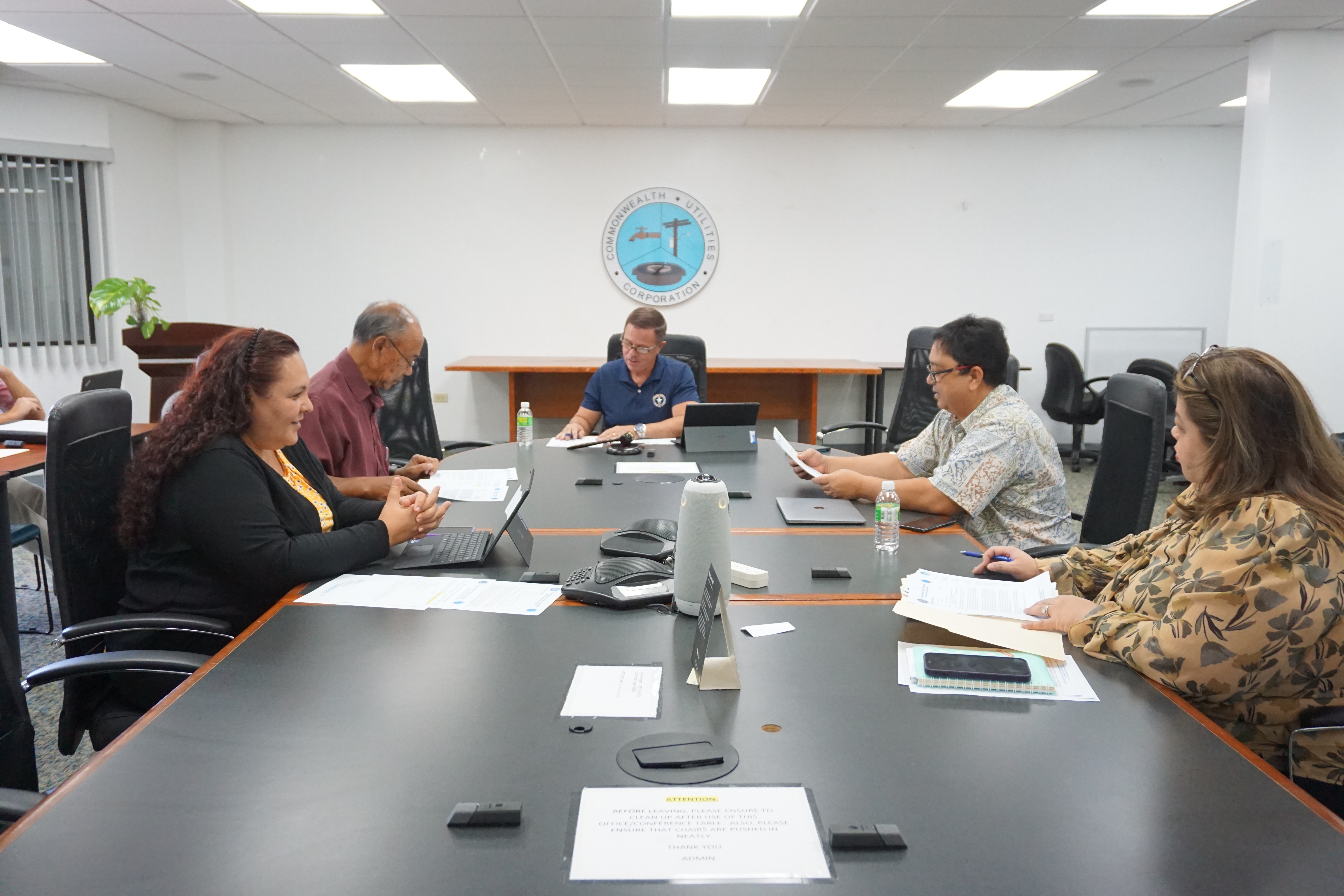 Acting Board Chair Donald Browne with board members Simon A. Sanchez, Rebecca White and Rufo Mafnas conduct a meeting in the CUC conference room on Wednesday afternoon with acting Executive Director Betty Terlaje.        