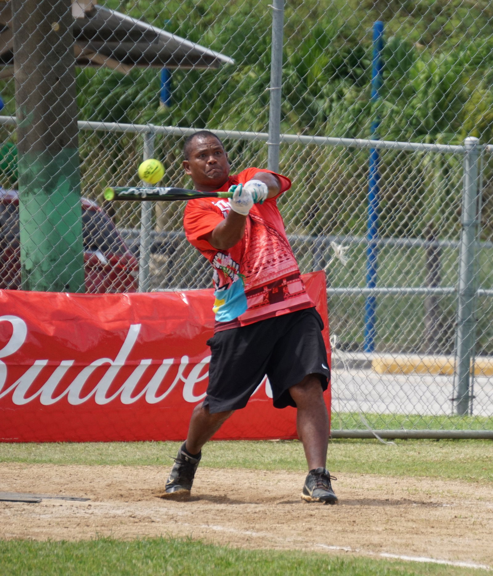 Saipal's Dominic Hideo connects the three-run homer during a playoff game of the 2023 Belau Amateur Softball Association Open League at the Dandan baseball field on Sunday.