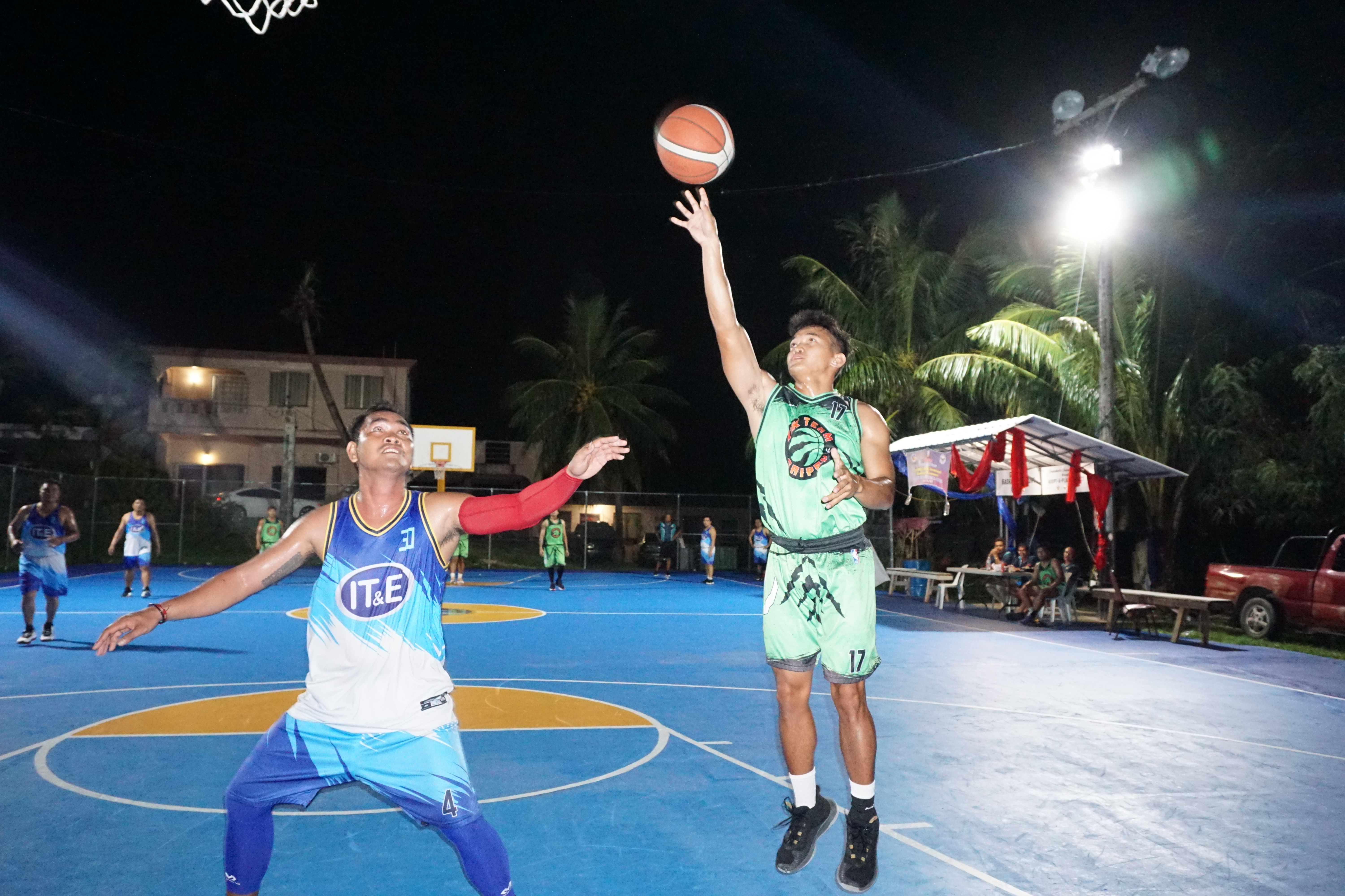 Vik Team's Randel Nicodamus extends for the floater during a playoff game in the open division of the 2023 Saipan Magalahi Eagles Club Invitational Basketball League on Wednesday at the Gualo Rai basketball court.
