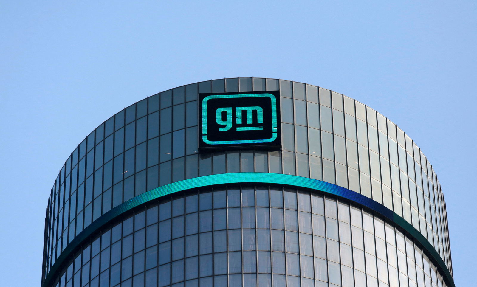 The GM logo is seen on the facade of the General Motors headquarters in Detroit, Michigan, March 16, 2021.