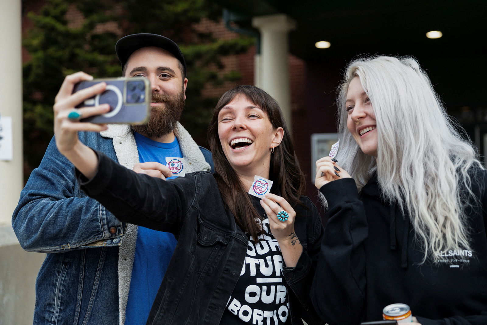 Voters take a selfie at a polling location as voters in Ohio decide whether to enshrine abortion protections into the state constitution, in Columbus, Ohio, U.S. November 7, 2023. 