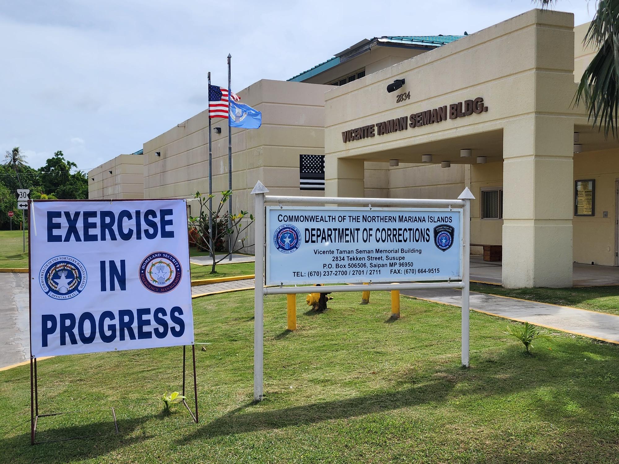 A sign regarding the exercise in progress is seen at the Department of Corrections on Wednesday.