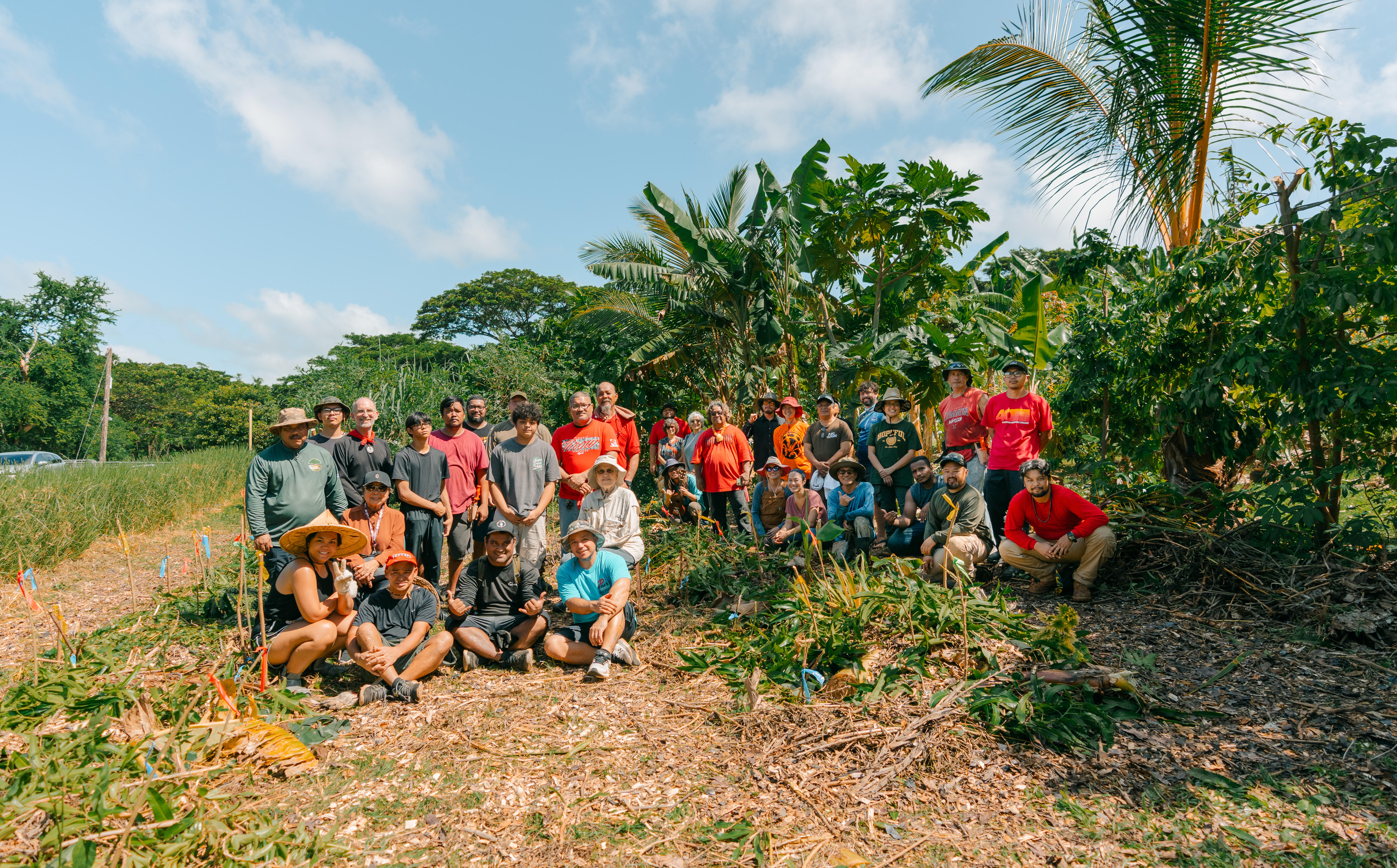 Participants at Saipan’s regenerative agriculture workshop hands-on demo gather for a group photo with their newly completed agroforestry farm.