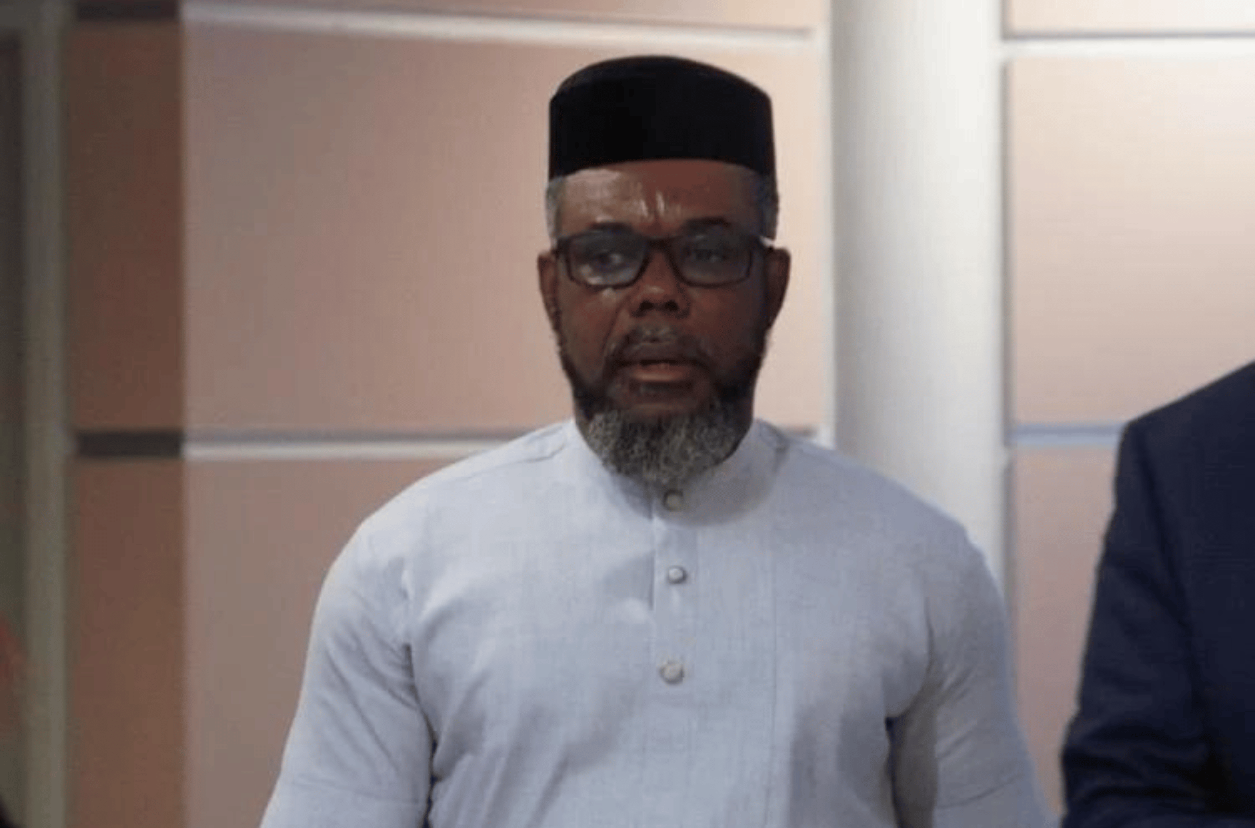 Ugochukwu Akoma walks out of court after his hearing Tuesday, May 9, 2023, in Hagåtña. 