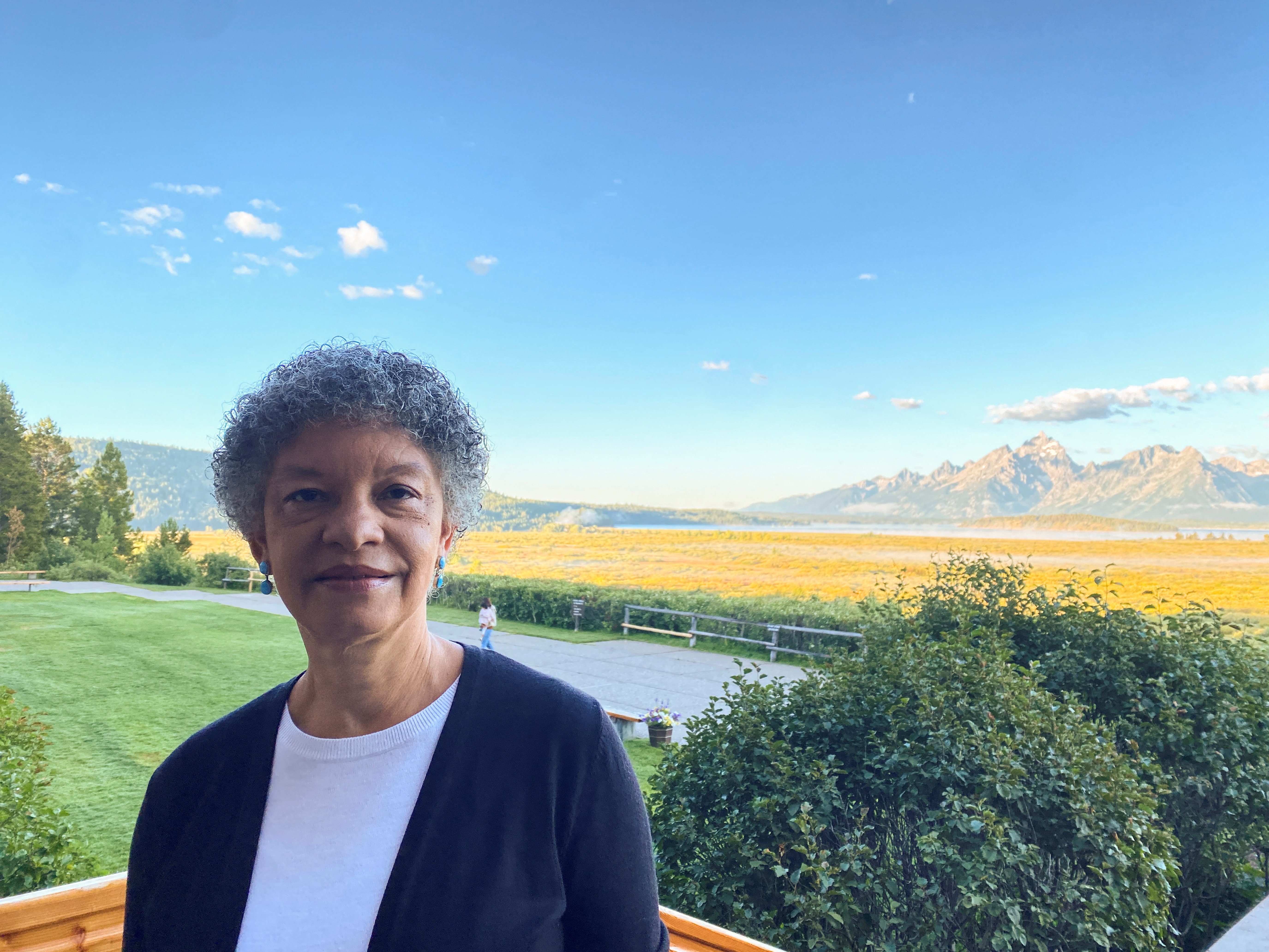 Federal Reserve Bank of Boston President Susan Collins stands behind the Jackson Lake Lodge in Jackson Hole, where the Kansas City Fed holds its annual economic symposium, in Wyoming, U.S., August 24, 2023. 