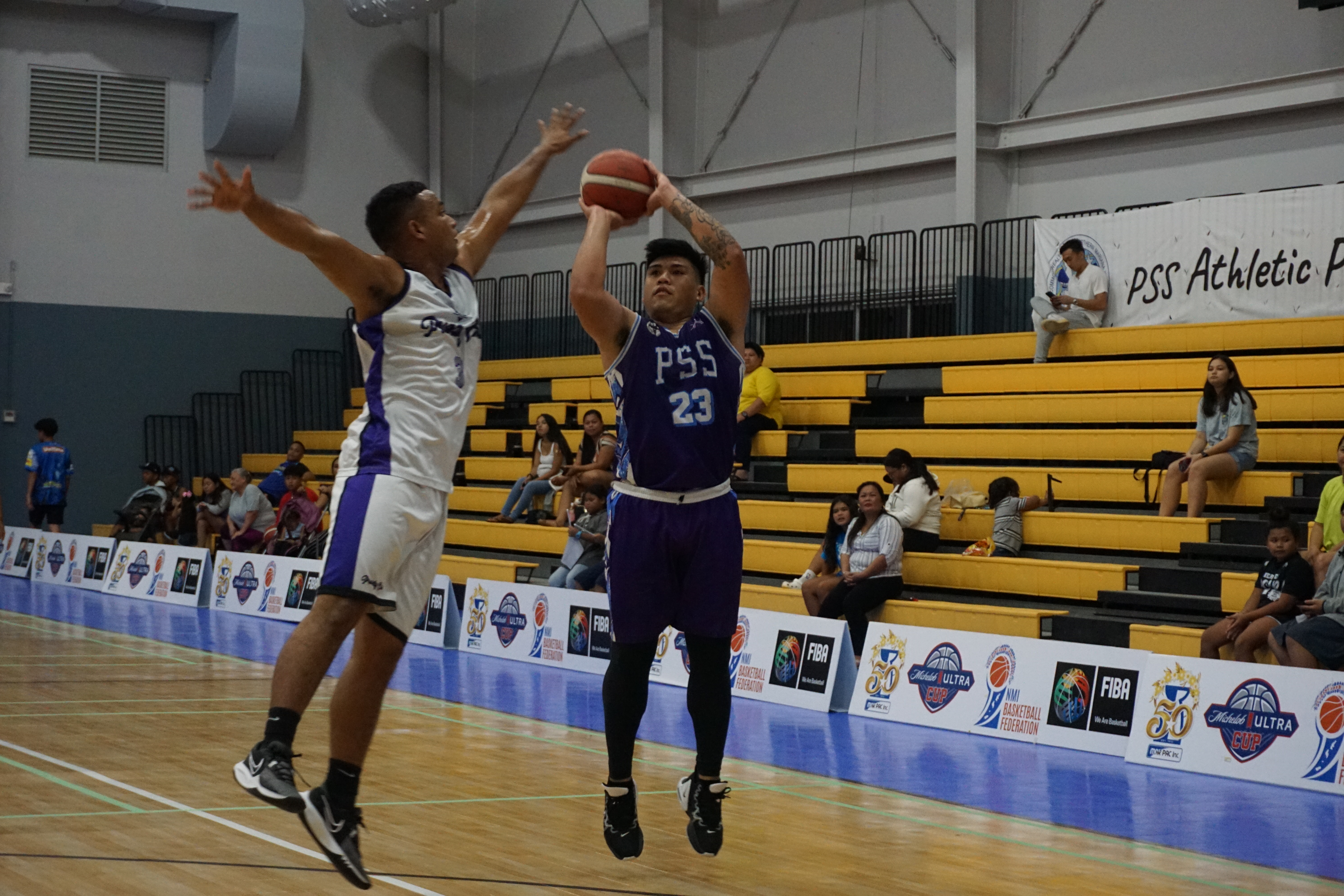 PSS's Mii Tekopua pulls up for the three-point shot over a defender during a playoff game of the 2023 R&J Wine and Liquor Inter-Government/Business League at the Ada gym on Tuesday.