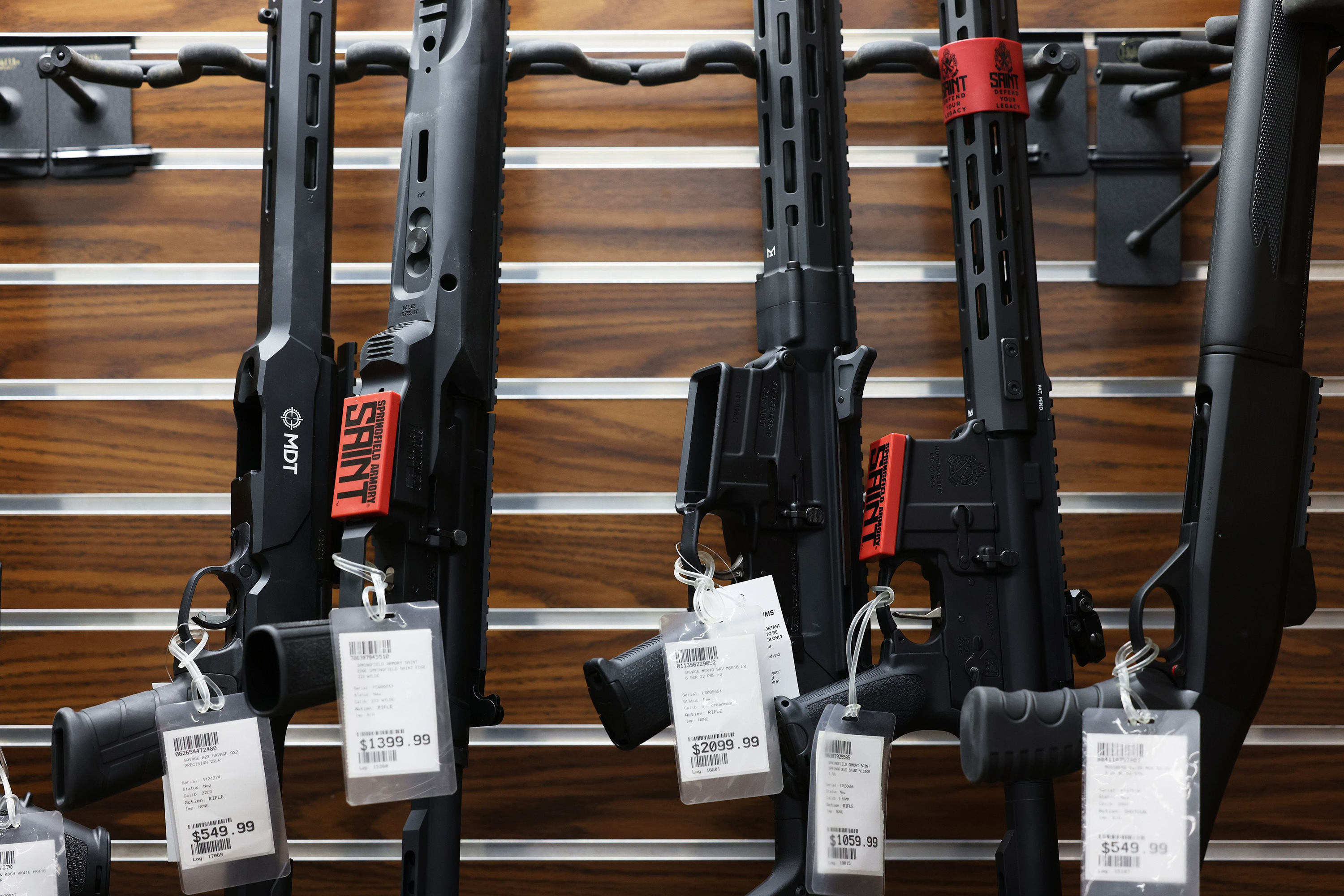 A display case holds an assortment of rifles that cannot be sold to customers due to the state's sweeping firearms ban at Accuracy Firearms in Effingham, Illinois, on Jan. 26, 2023. (John J. Kim/Chicago Tribune/TNS)