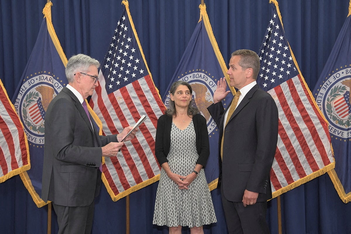 Michael Barr is sworn as Federal Reserve Vice Chair for Supervision by U.S. Federal Reserve Chairman Jerome Powell in the press briefing room of the William McChesney Martin Federal Reserve Board Building in Washington, U.S. July 19, 2022. 