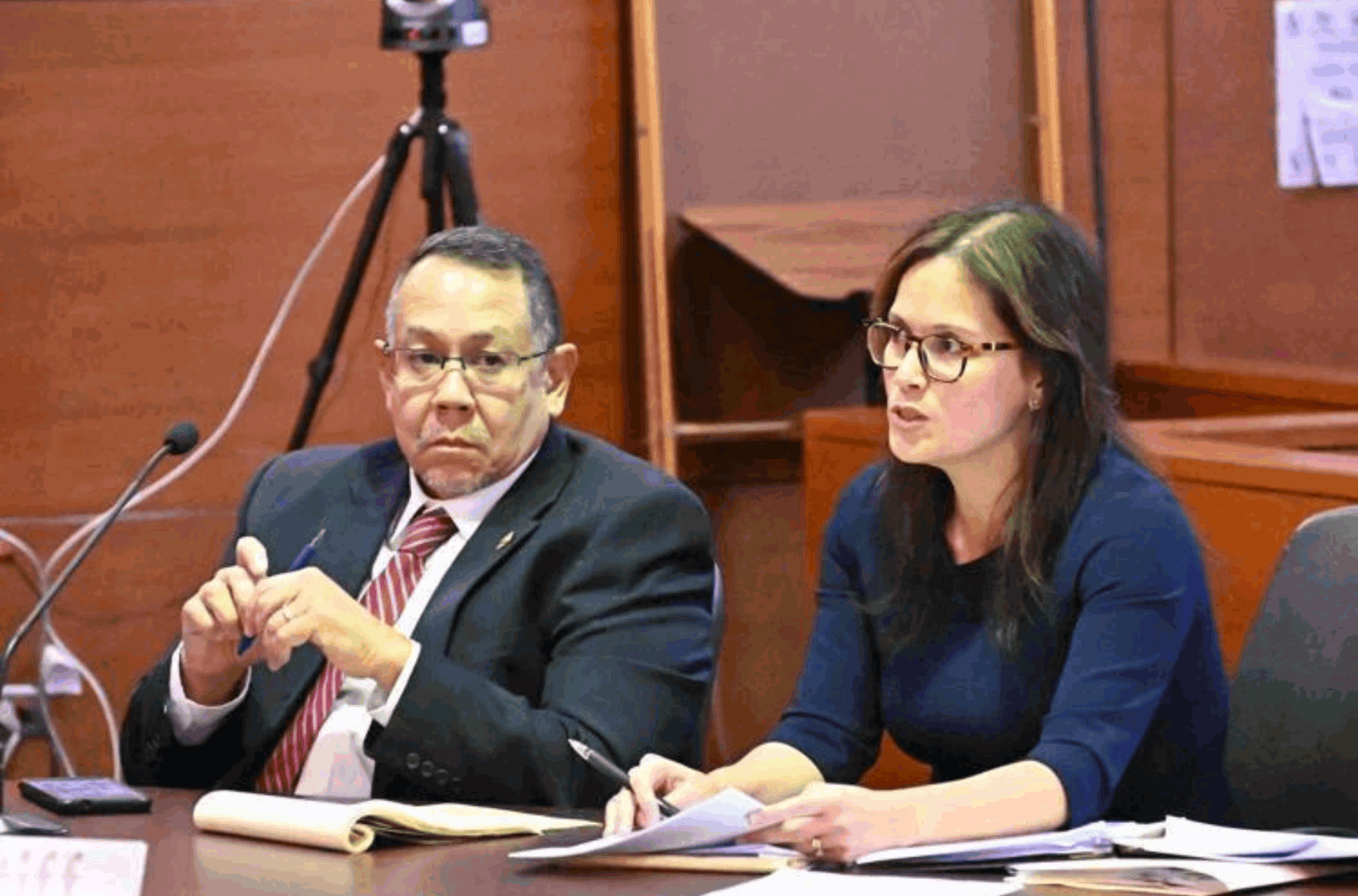 Attorney Jay Arriola, left, goes over details during a hearing for his client, Alejo C. Sablan, right, Wednesday Nov. 8, 2023 at the Superior Court of Guam in Hagåtña. 