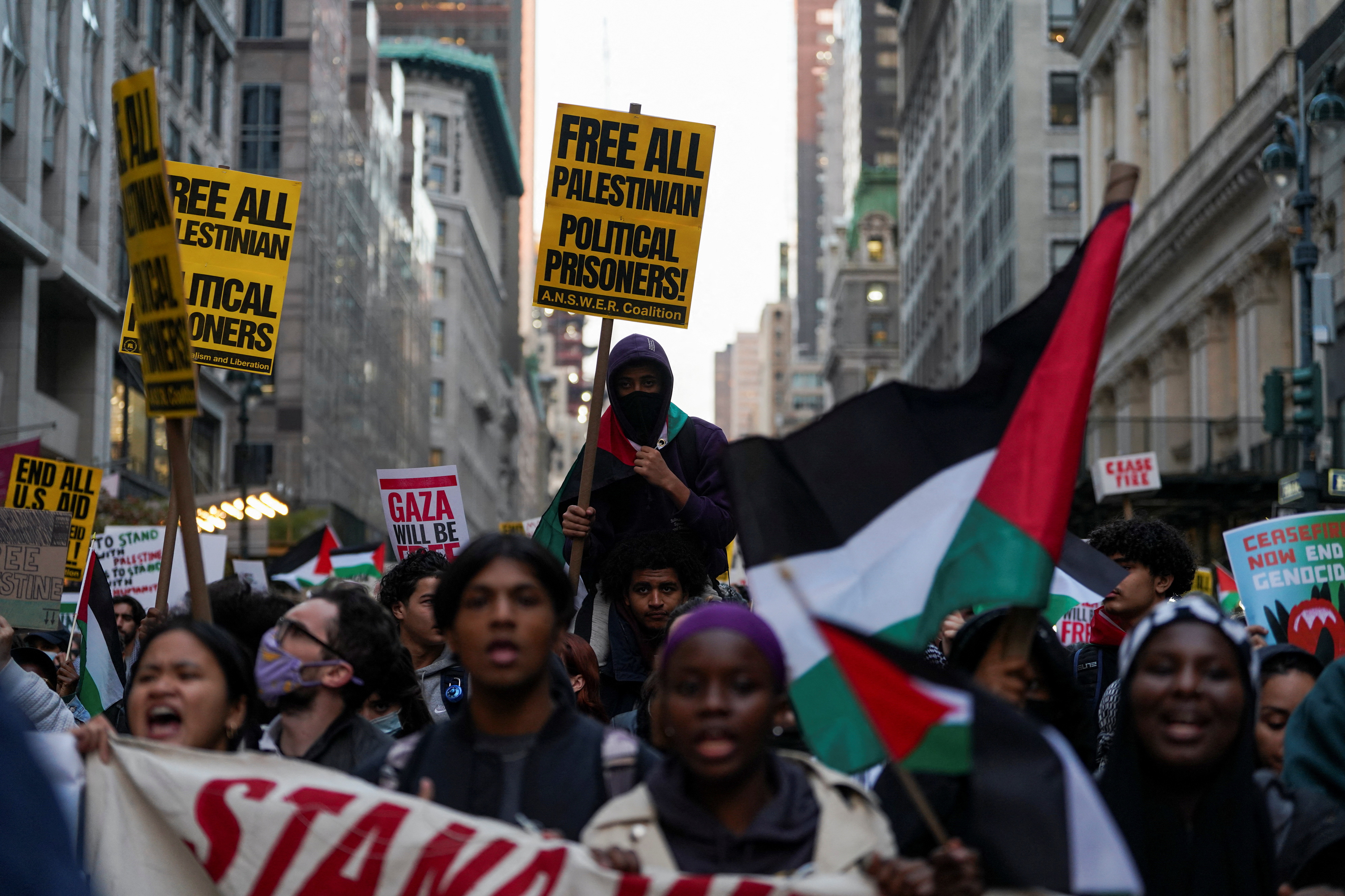 People take part in a rally in support of Palestinians in Gaza, in New York City, U.S., November 9, 2023. 