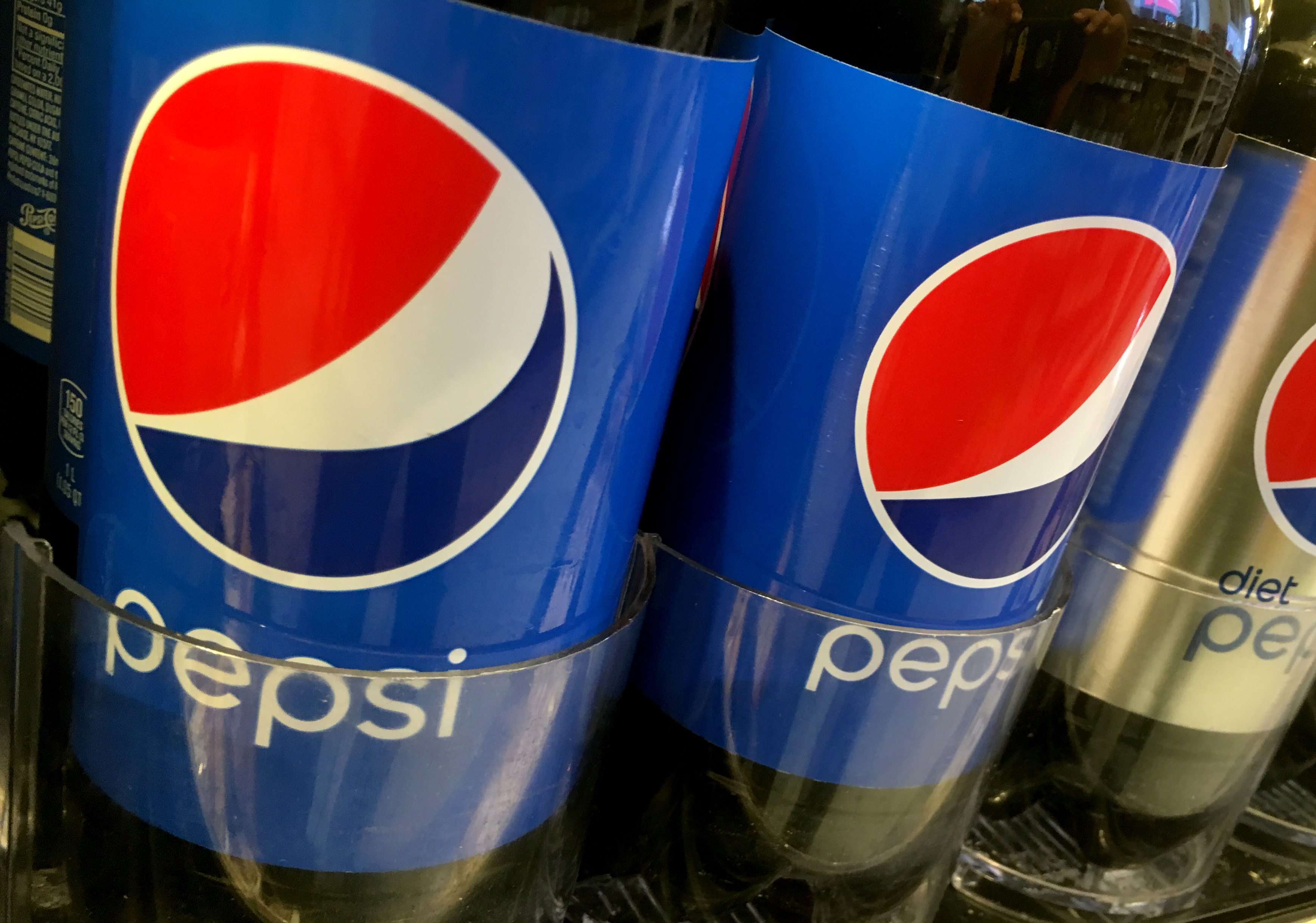 Pepsi bottles are seen lined up at a store in New York, U.S. July 5, 2016. Picture taken July 5, 2016. 