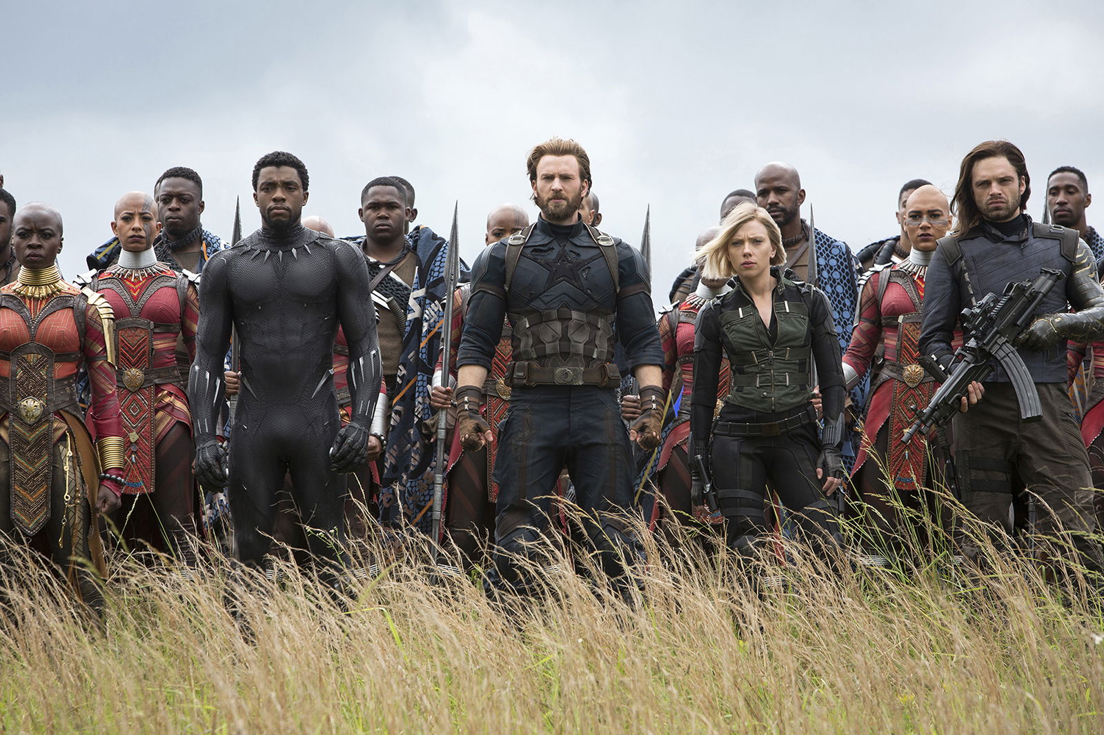 Stunt actor Taraja Ramsess, who died in a car crash on Halloween, stands just behind Scarlett Johansson, fifth from right, in a scene from Marvel’s 2018 film “Avengers: Infinity War.” (Chuck Zlotnick/Marvel Studios/Disney/TNS)