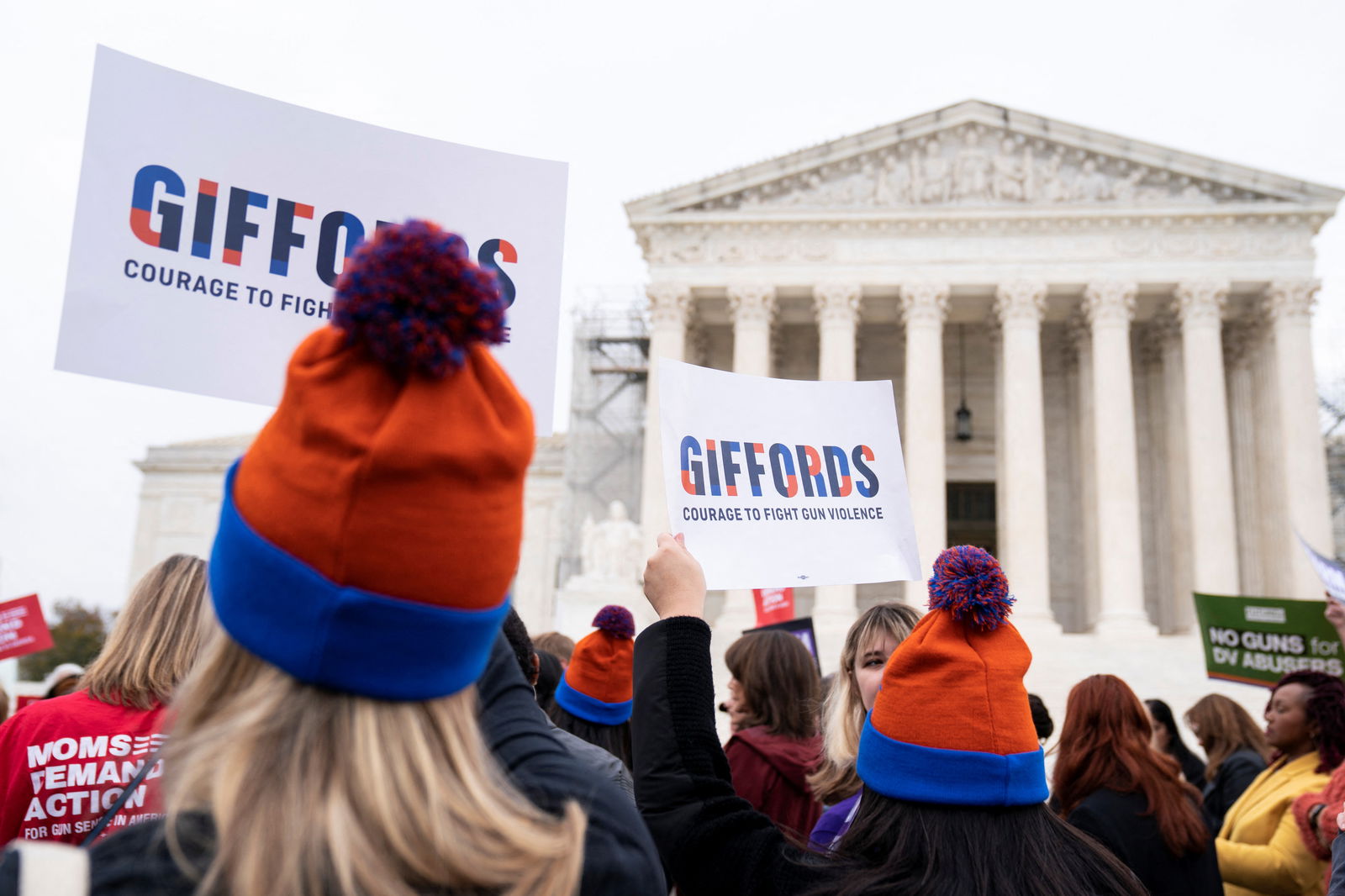 People participate in a demonstration as the US Supreme Court considers legality of domestic-violence gun curbs at the Supreme Court in Washington, D.C., U.S., November 7, 2023. 