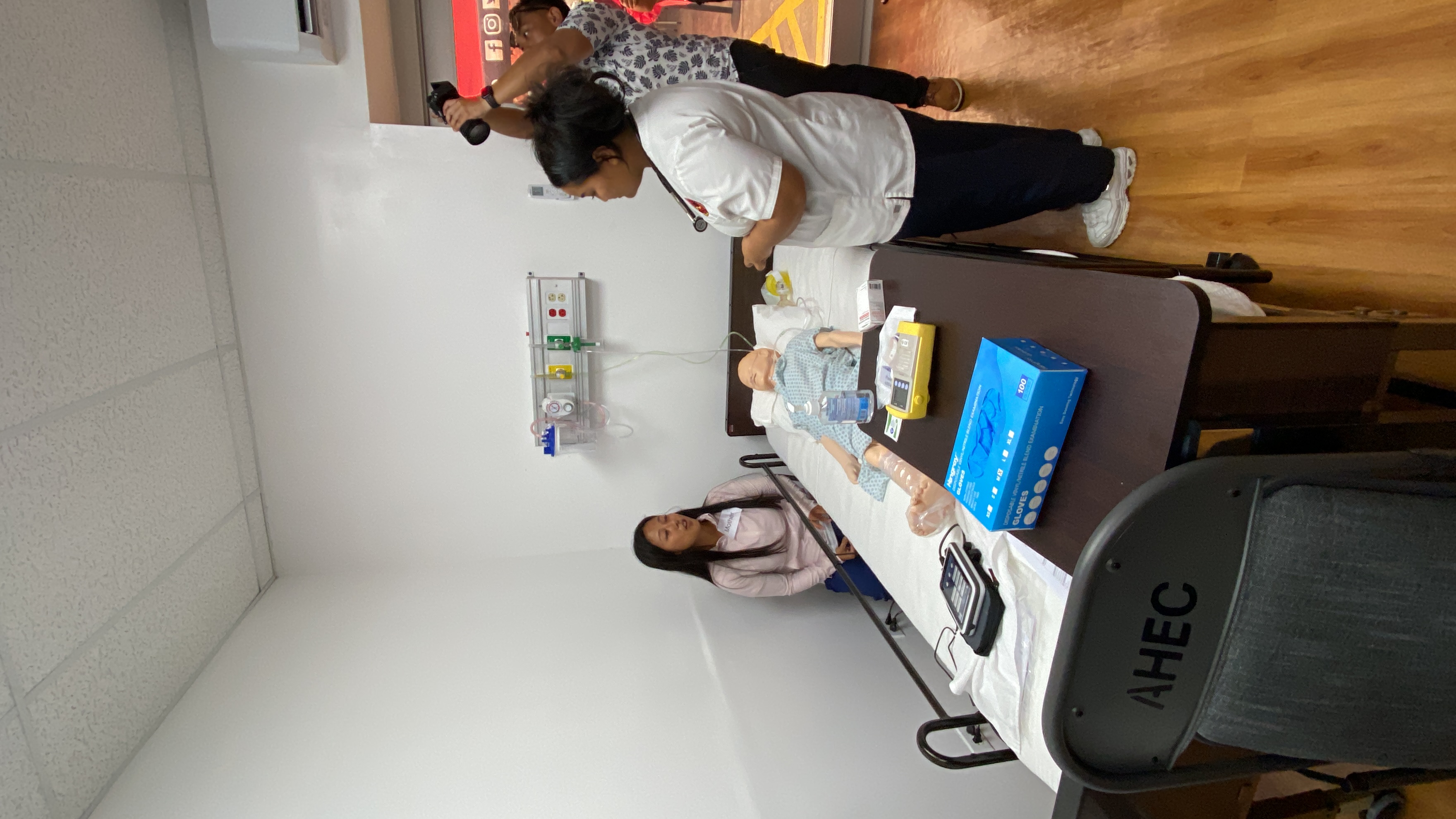 NMC students use a high-fidelity mannequin to simulate a six-year-old patient who has a history of asthma.