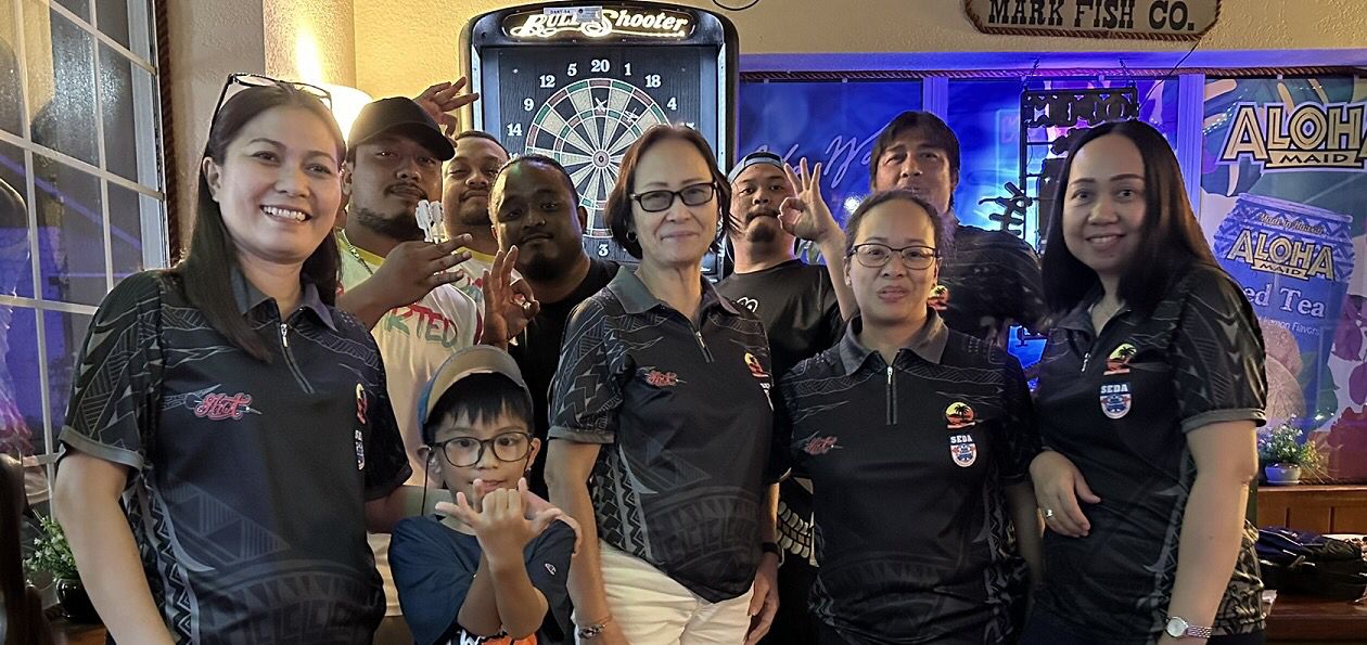 Bistro Marianas Redarted and Tom Yum Shot Shooters pose for a photo after the Bud Light Cup, Kingfisher C Division championship game of the 2023 SEDA Bud Light Dart League  at the Bistro Marianas Restaurant & Bar on Saturday.