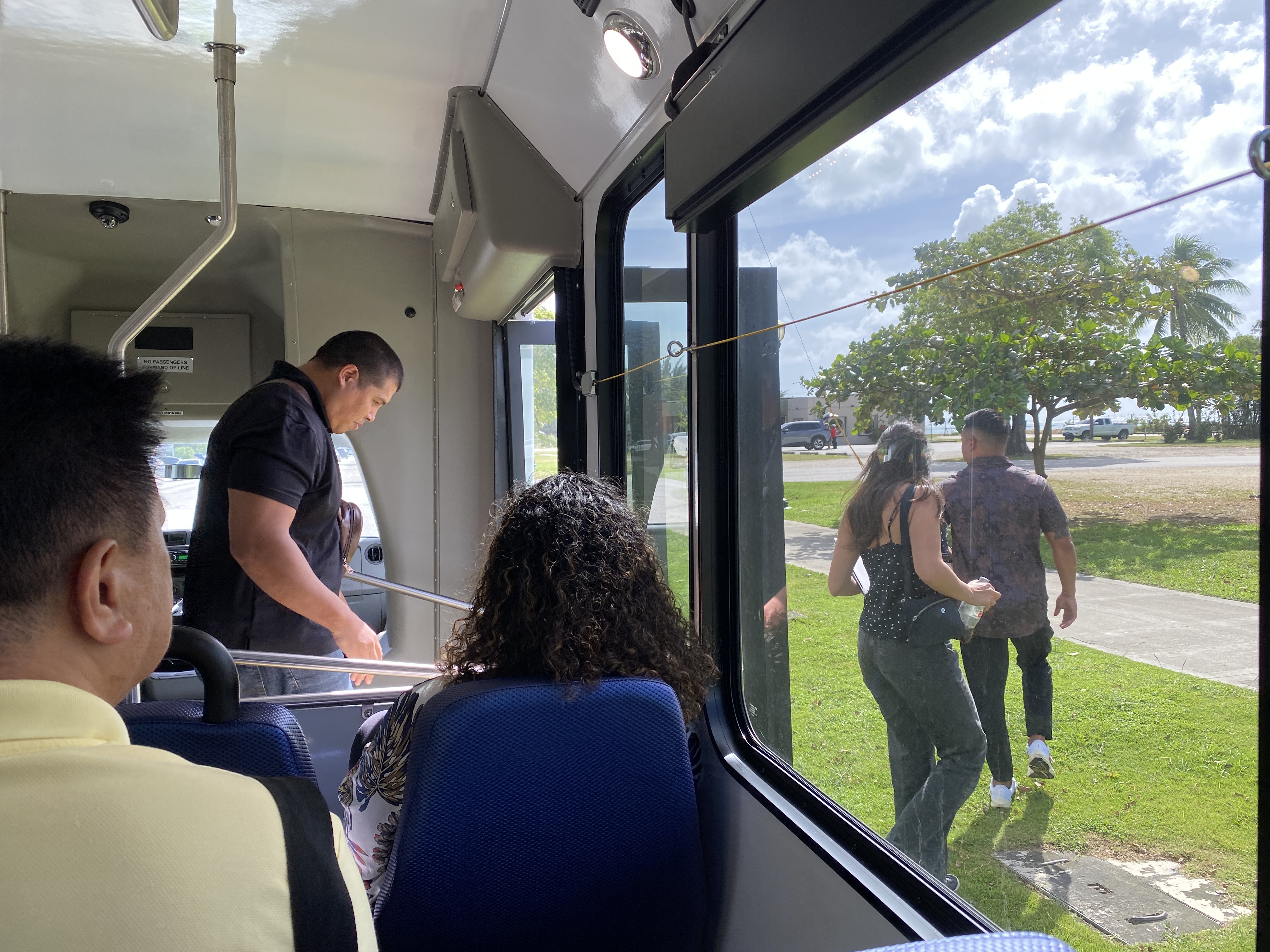The staff of Turn Key Solutions, who were on the media ride, get off at the Garapan Fishing Base southbound stop, and walked to their nearby office. 