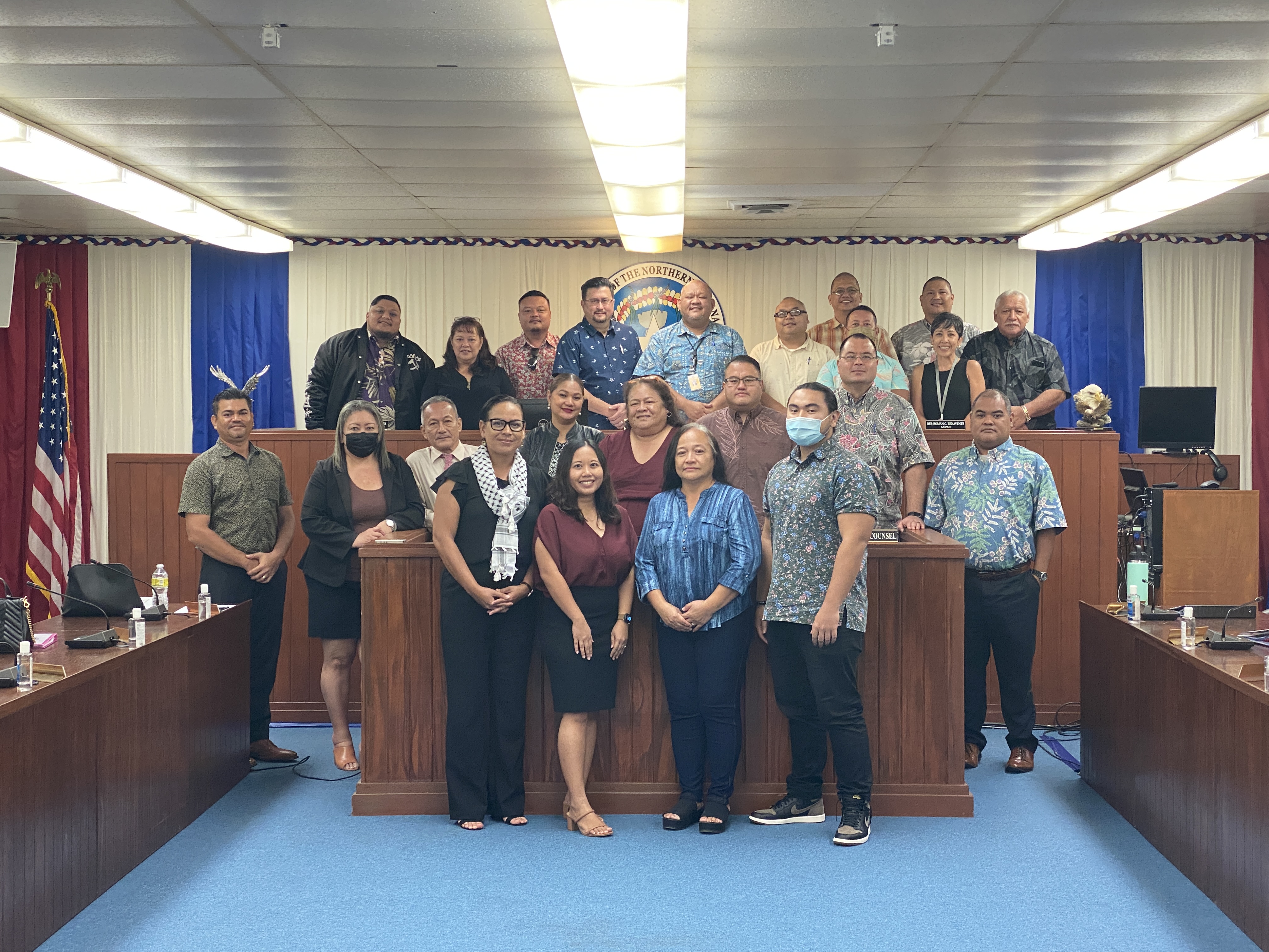 Members of the Saipan and Northern Islands Legislative Delegation and the Saipan Higher Educational Financial Assistance board, including its administrator, pose for a photo in the House chamber on Wednesday.