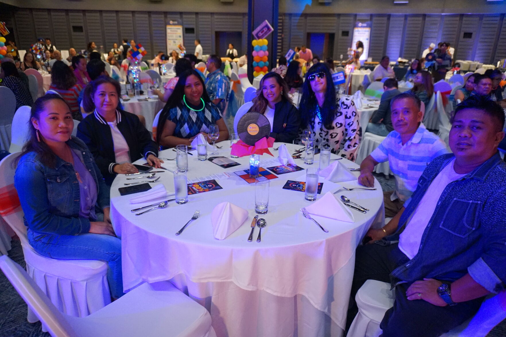 Mabel Ayuyu Glenn, center, with other members of the McDonald's family.