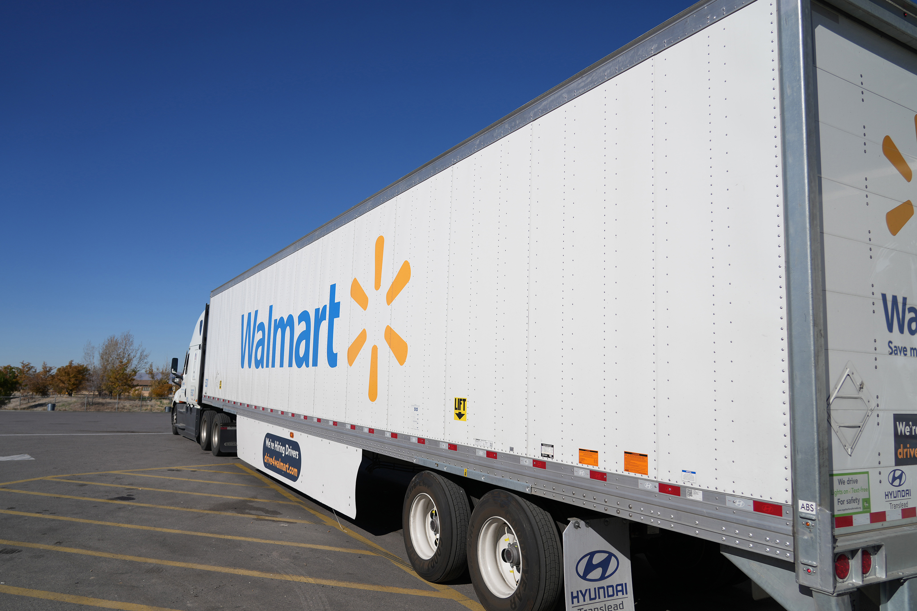A Walmart truck pulls away after fueling up at the Loves Truck stop on Nov. 5, 2021, in Springville, Utah. After fatalities rose for the eighth straight year in 2023, federal transportation officials are moving ahead with new rules designed to make trucks less deadly. (George Frey/Getty Images/TNS)