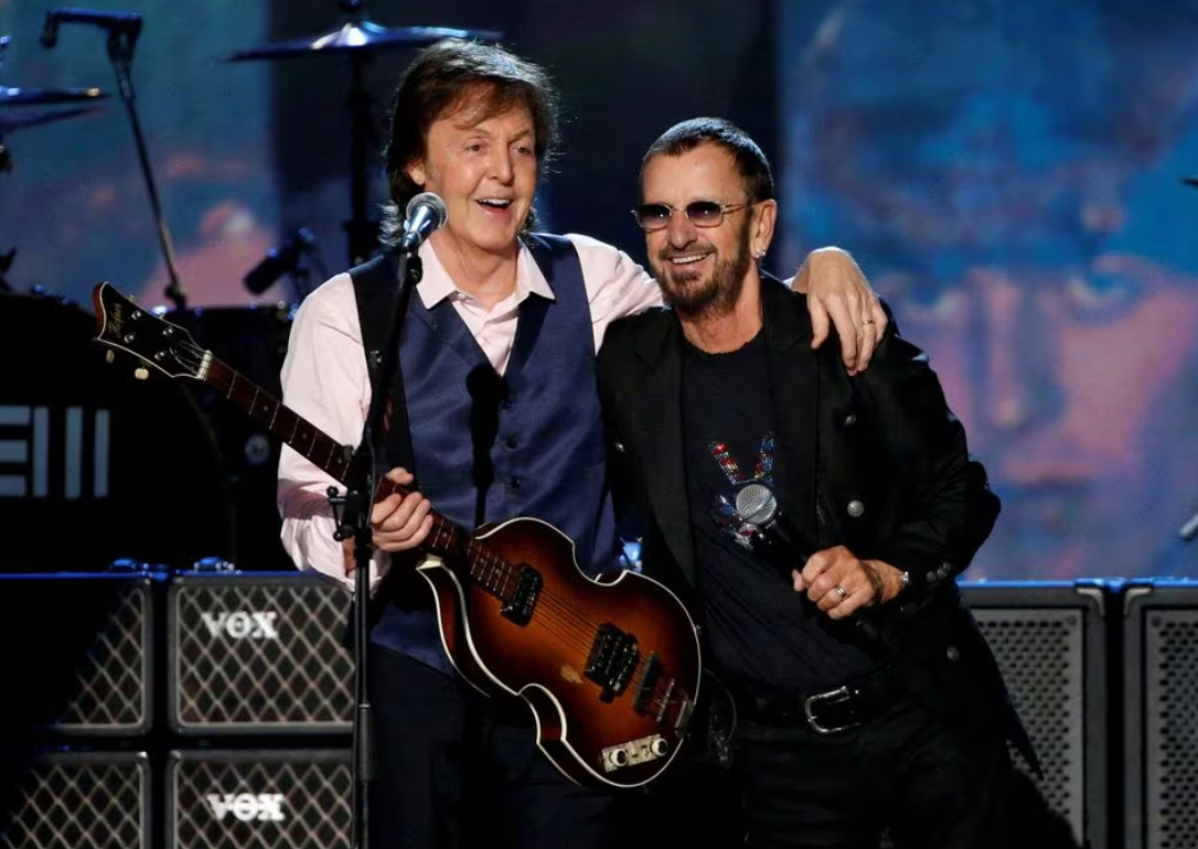 Paul McCartney and Ringo Starr perform during the taping of "The Night That Changed America: A Grammy Salute To The Beatles," which commemorated the 50th anniversary of The Beatles’ appearance on the Ed Sullivan Show, in Los Angeles, Jan. 27, 2014.