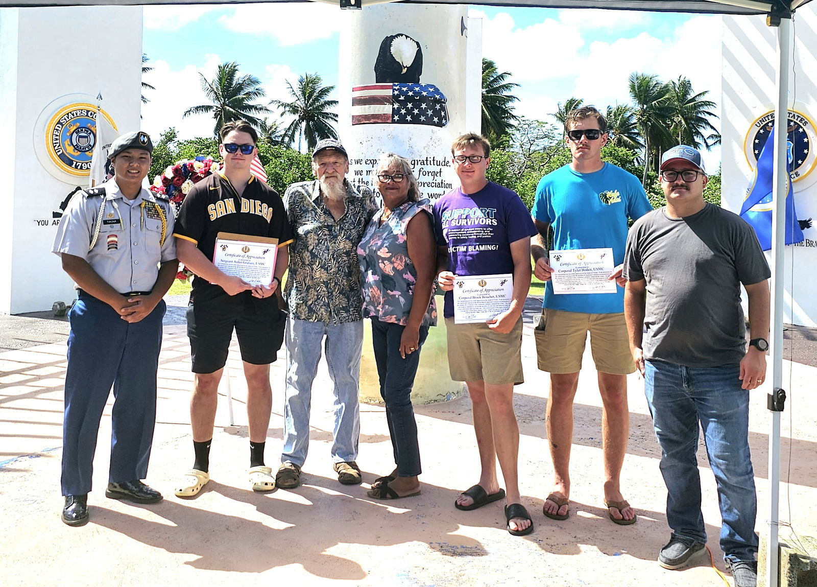 From left, Tinian ROTC Battalion Commander C/LTC Edward Tirona, Sgt. Aidan Graham, USMC, Historian Don Farrell, Acting Mayor of Tinian Ann Marie San Nicolas, Cpl. Brock Boucher, USMC, Cpl. Tyler Boden, USMC and Captain Matthew Jacobs, USAF, OIC, Expeditionary Red Horse squadron.