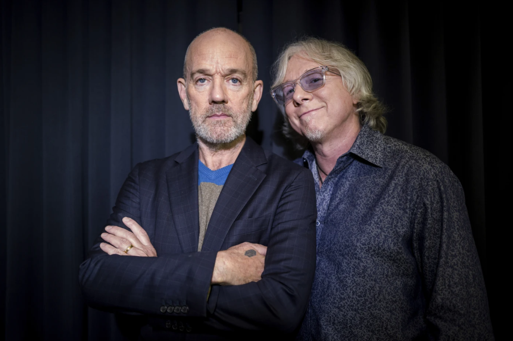 This Oct. 28, 2019 photo shows R.E.M.’s Michael Stipe and Mike Mills posing for a portrait in New York.
