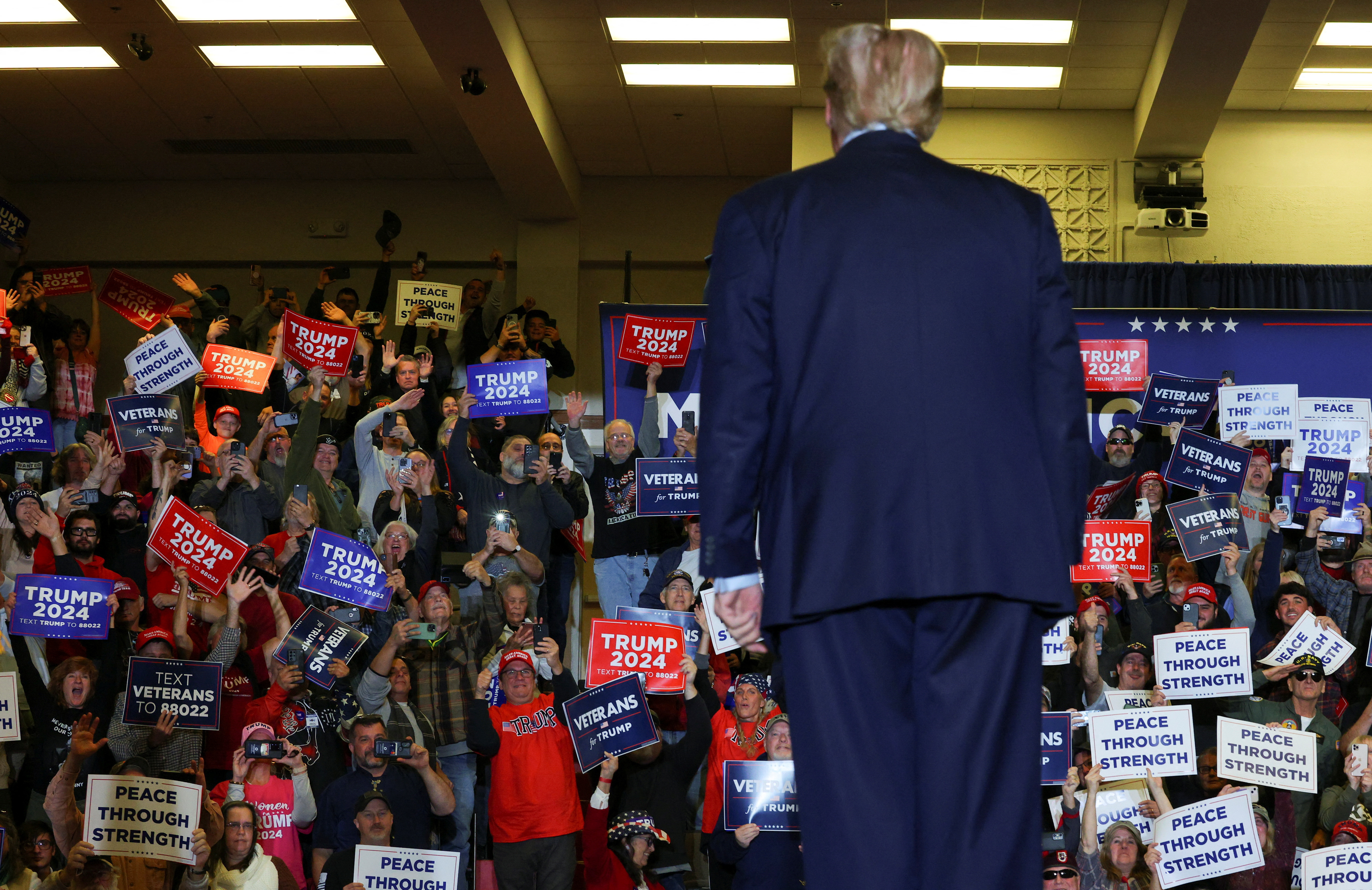 Republican presidential candidate and former U.S. President Donald Trump attends a campaign rally in Claremont, New Hampshire, U.S., November 11, 2023.