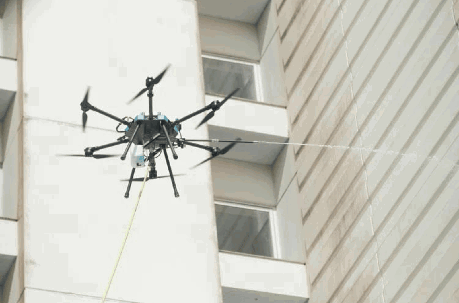 Bella Wings Aviation's "Lucid" drone is employed for an "AeroBlasting" demonstration in partnership with The Westin Resort Guam and JLG HydroBlast Guam at the Tumon hotel on Wednesday, Nov. 8, 2023. 
