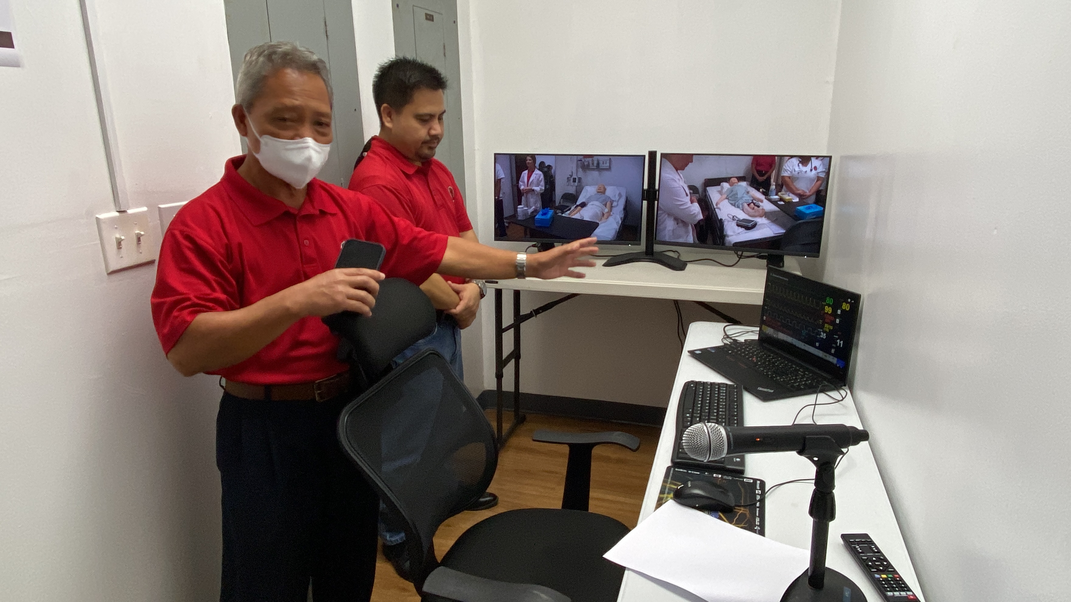 Johnny Aldan, an instructor at NMC, explains that inside this control room he can monitor students, adjust the vitals of mannequins and more.