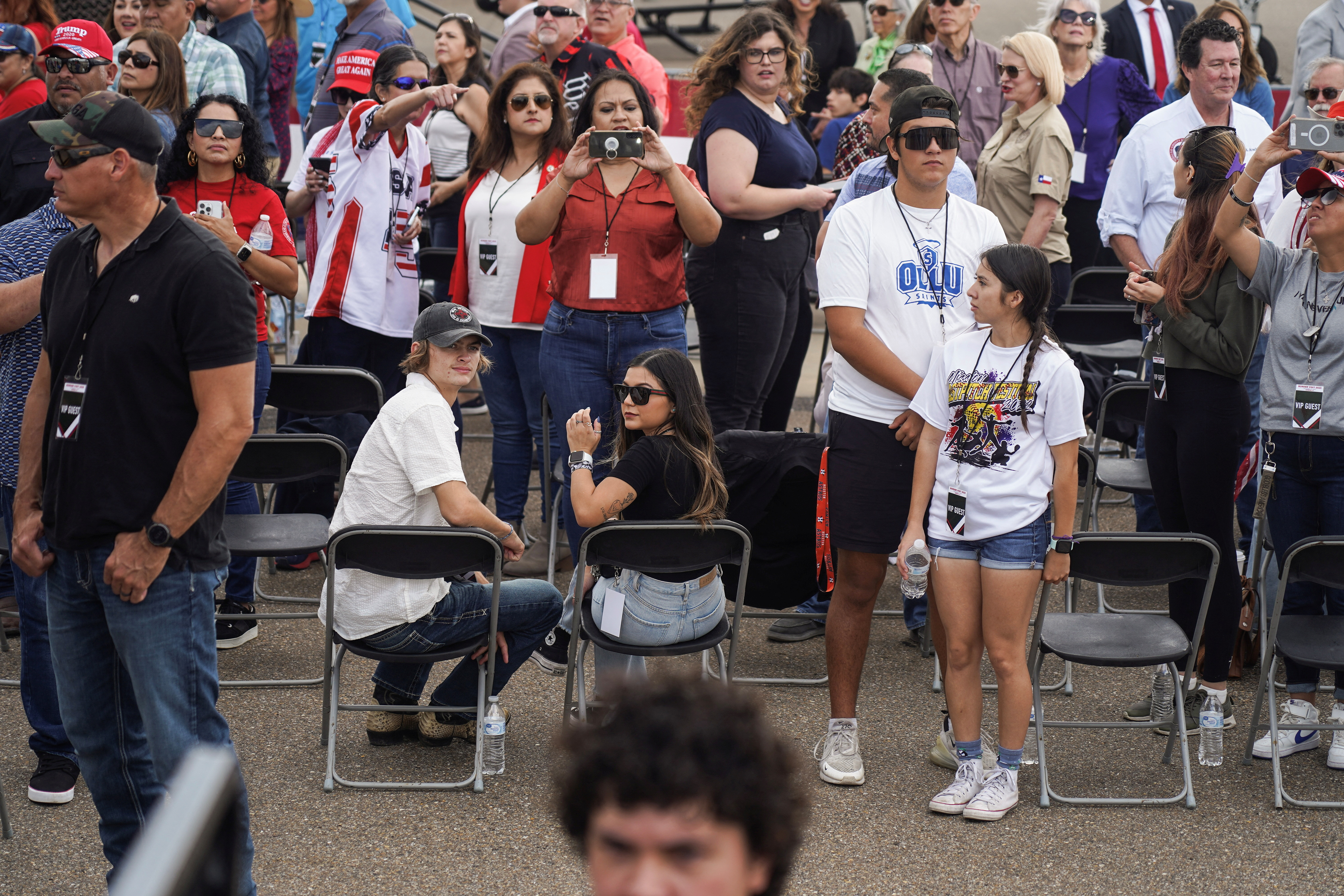 Trump supporters wait for the event to start for former U.S. President Donald Trump during his visit at the southern border with Texas Governor Greg Abbott in Edinburg, Texas, U.S. November 19, 2023. 