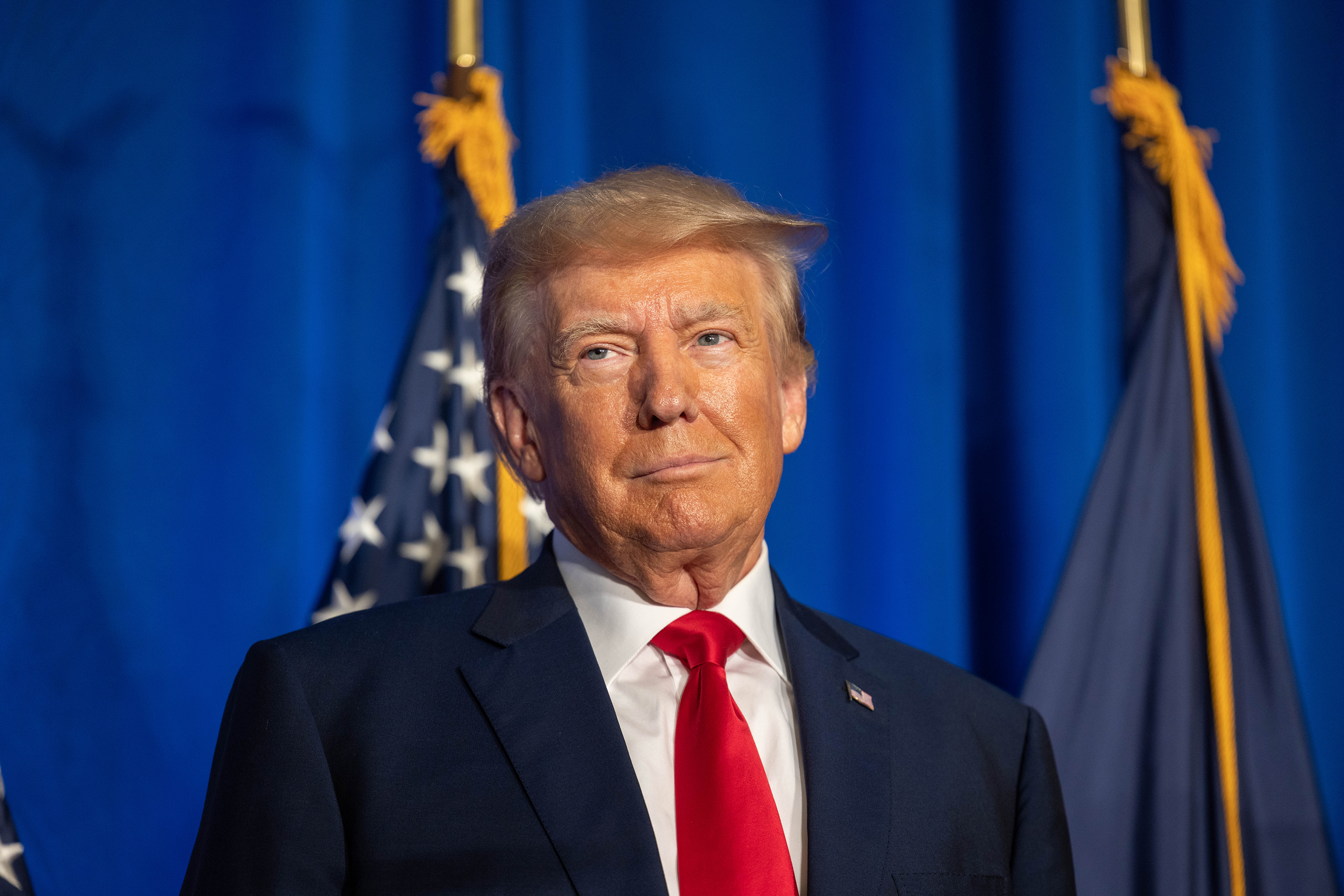 Republican presidential candidate, former President Donald Trump stands on stage after being introduced during the New Hampshire Federation of Republican Women's Lilac Luncheon on June 27, 2023, in Concord, New Hampshire. (Scott Eisen/Getty Images/TNS)