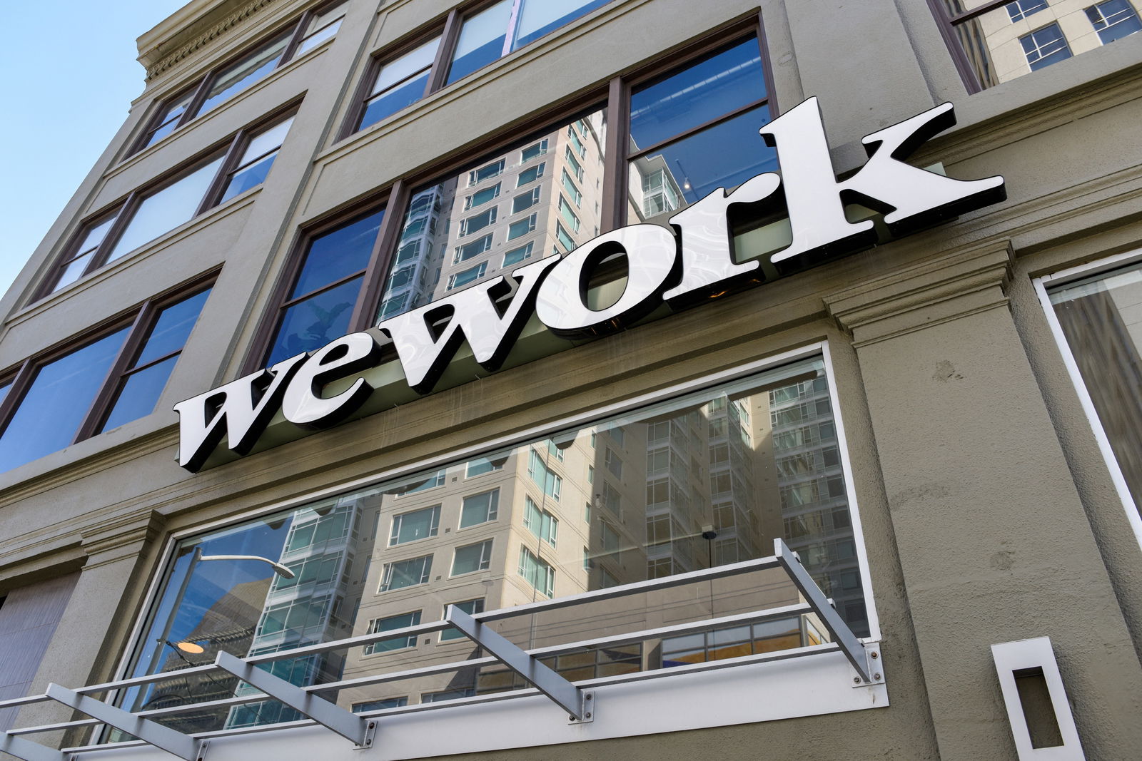 A WeWork logo is seen outside its offices in San Francisco, California, Sept. 30, 2019.