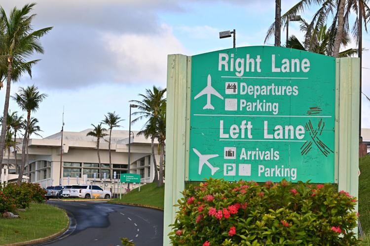 A traffic direction sign in front of the A.B. Won Pat International Airport is seen Monday, Sept. 25, 2023, in Tiyan. 